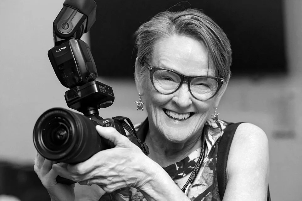 Atlanta Wedding Photographer Cindy Brown laughing whilie holding camera