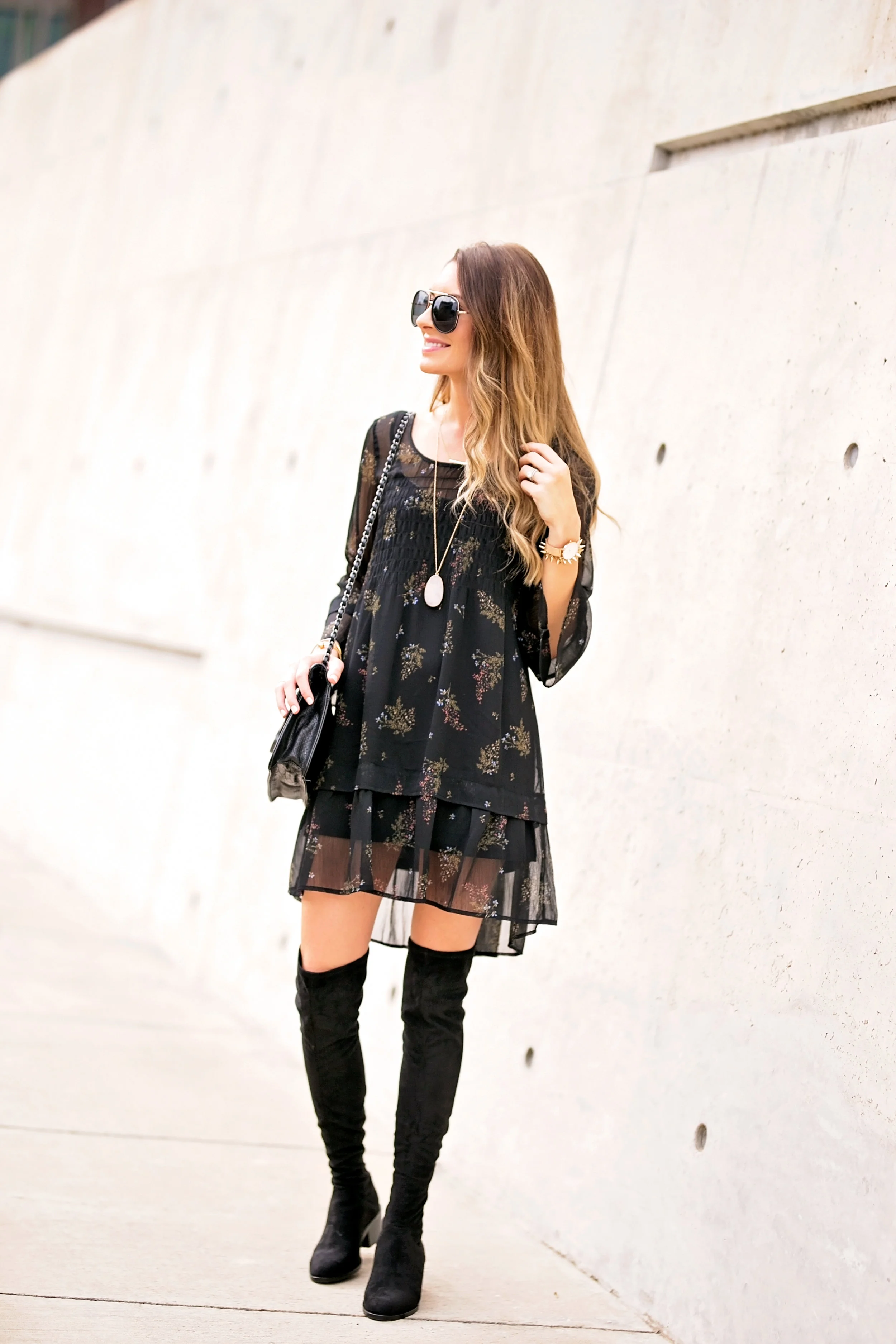 all black outfit with thigh high boots