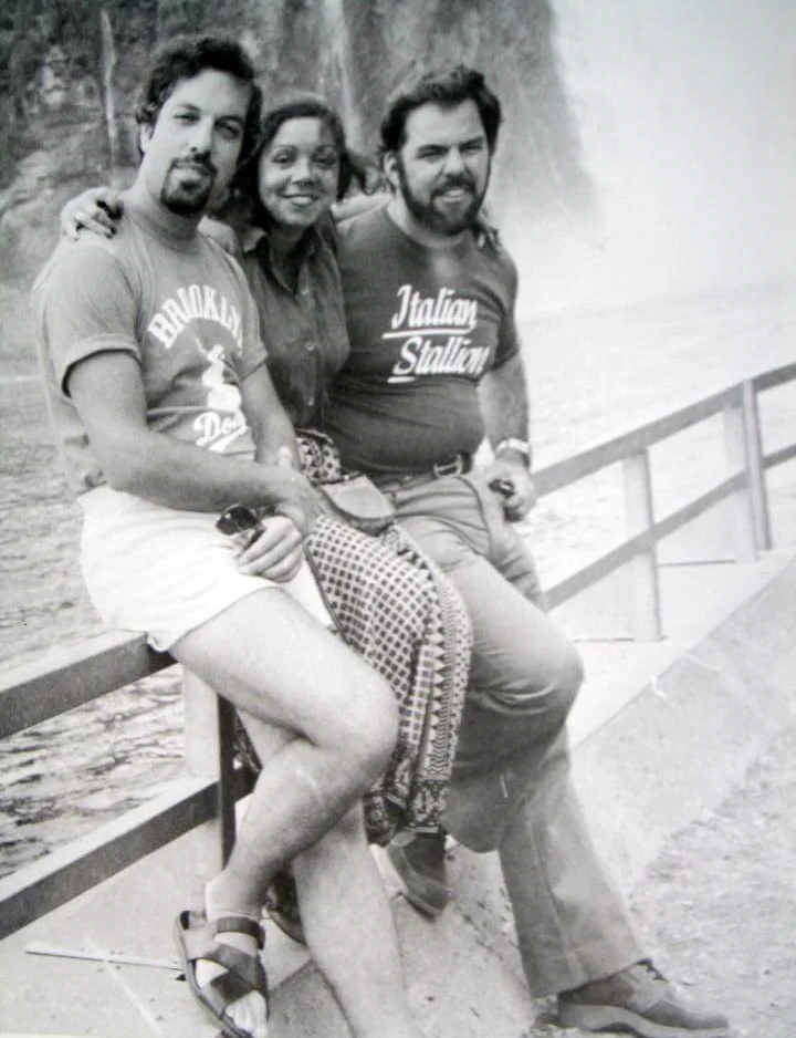 In the white shorts, Dad. Lady friend. The Italian Stallion, Sal. 