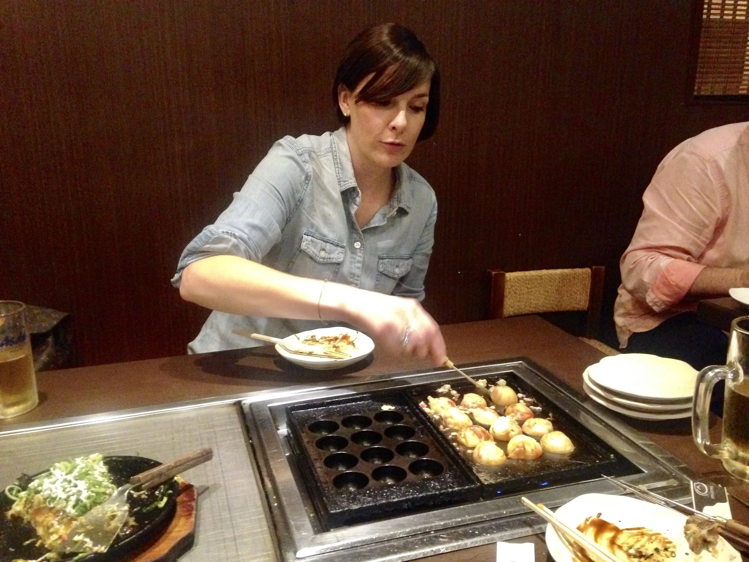 Kyoto, Japan eating Takoyaki