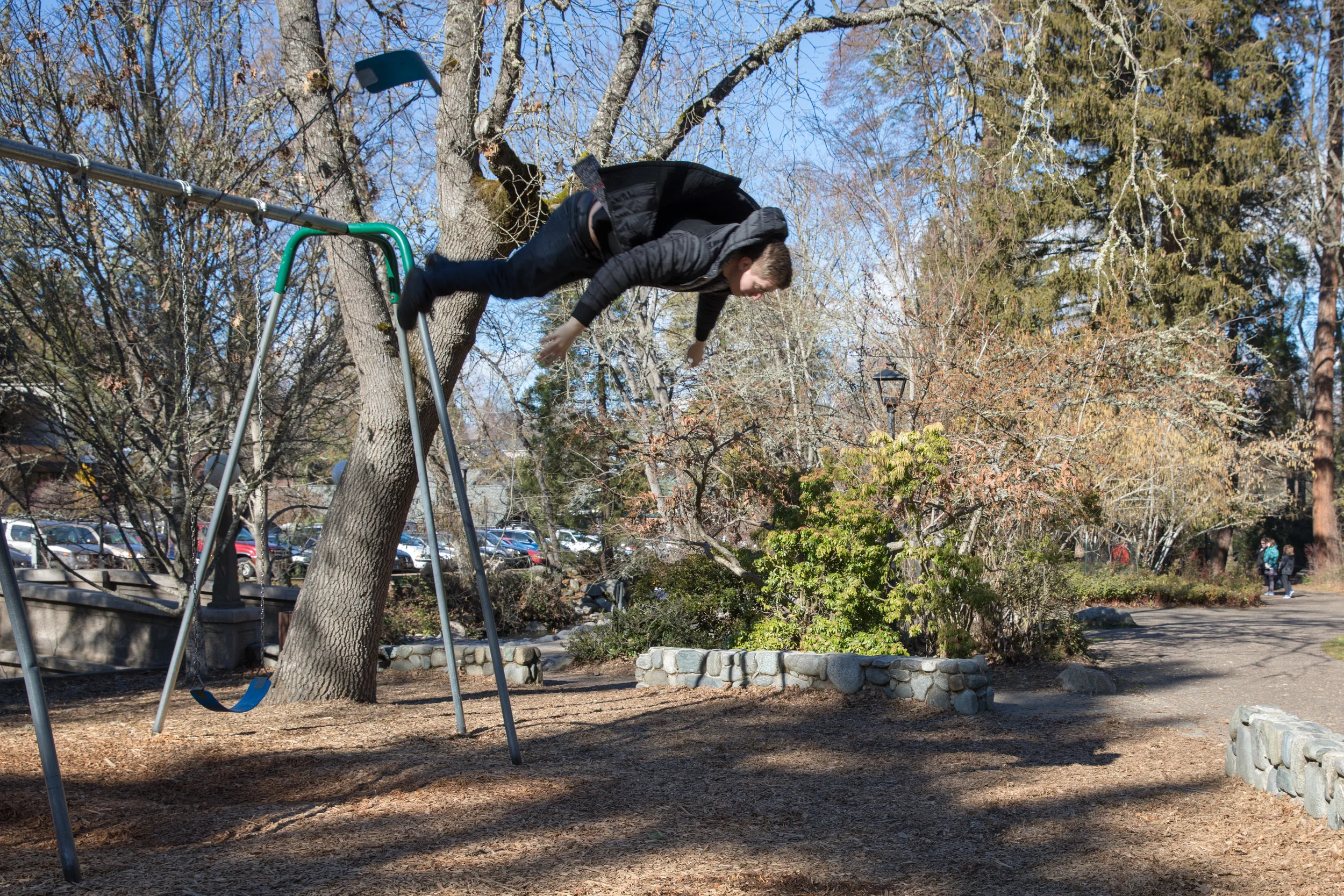 This future stuntman just did a flip off the swing!