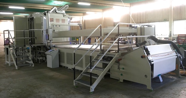 Kinzel 1-color 69” x 150” (1.75 x 3.8 meter) flatbed printing line with CCD camera registration for processing 0.004” (0.025 mm) unconditioned thick mylar substrate at 3 prints/minute is ready for customer equipment approval. For short production runs, printed material can be transported from the end to the beginning for subsequent colors.