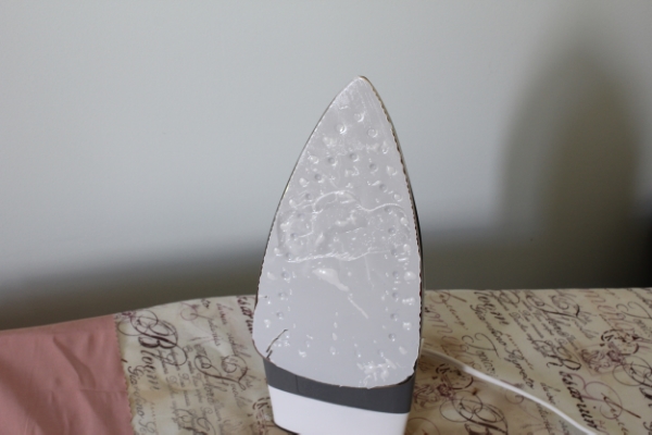 Dear iron company...not cool of you to put plastic on the iron. I have enough problems.