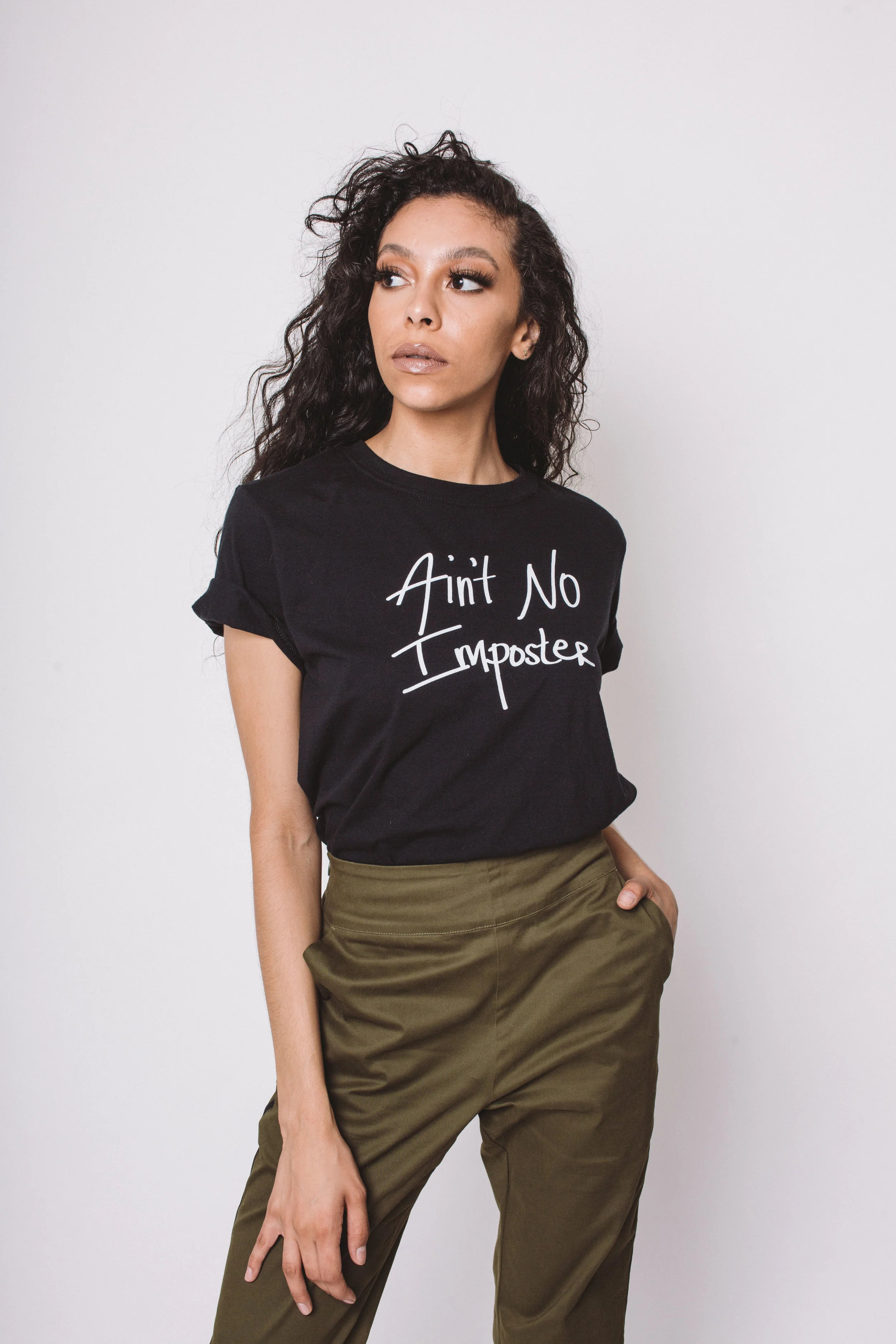 Ain't No Imposter Black Cotton Short Sleeve Tee on model side view