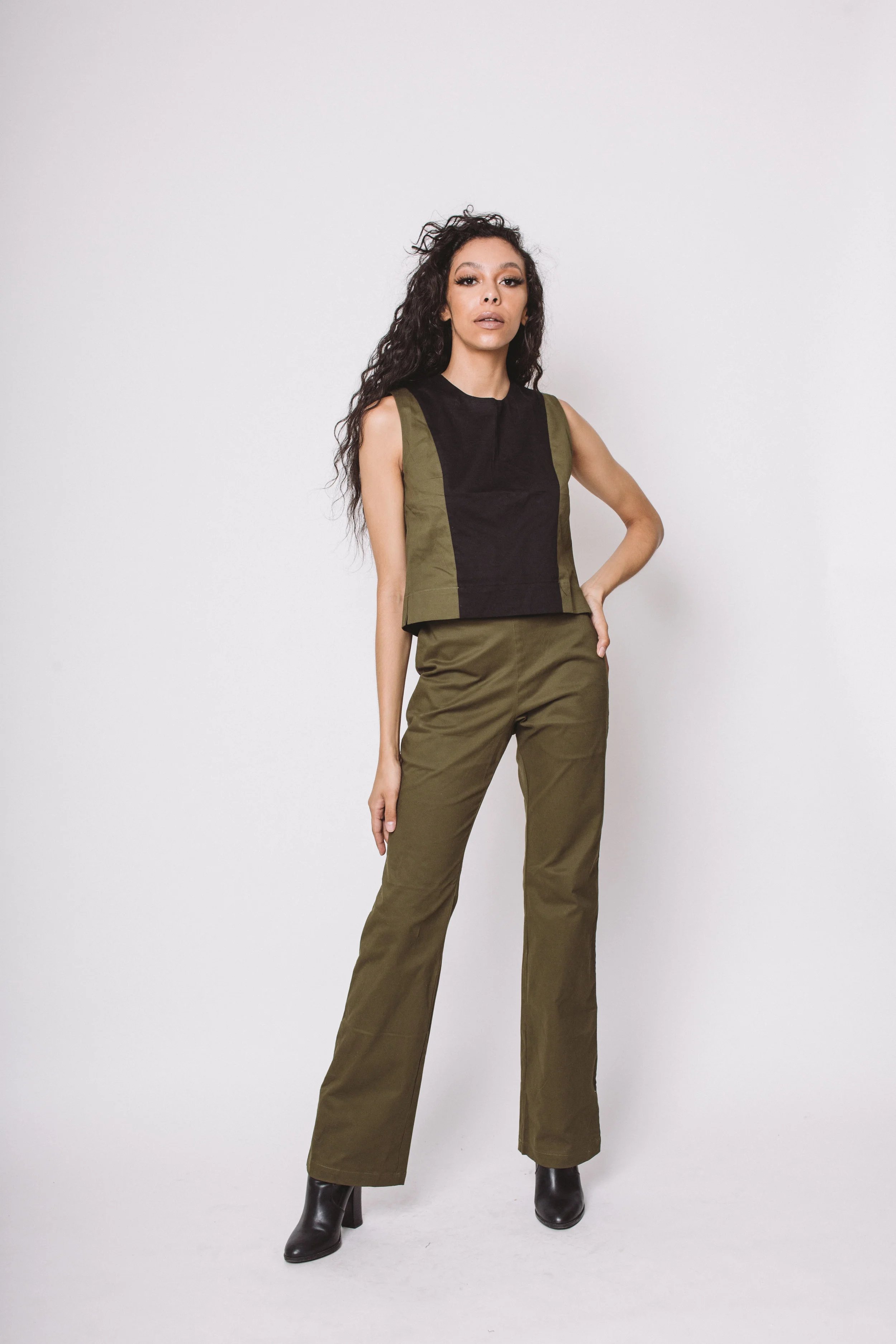 black pants with green side stripe