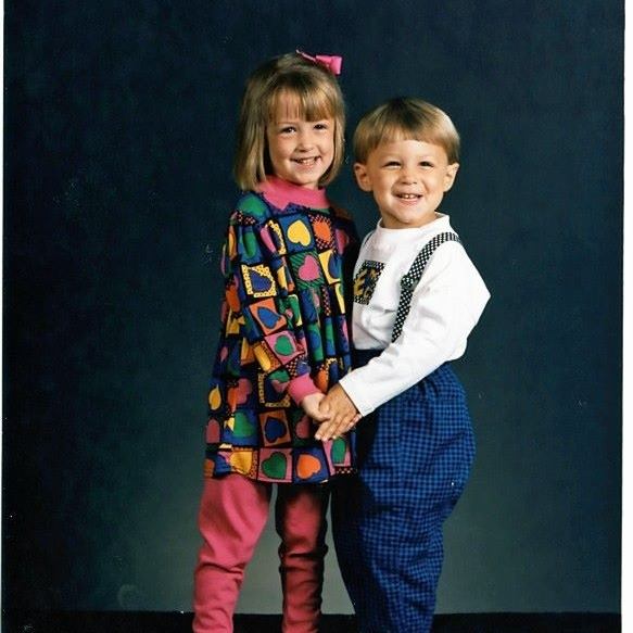Chris and his sister Kaley, a la 1992. Also, suspenders? Parachute pants?