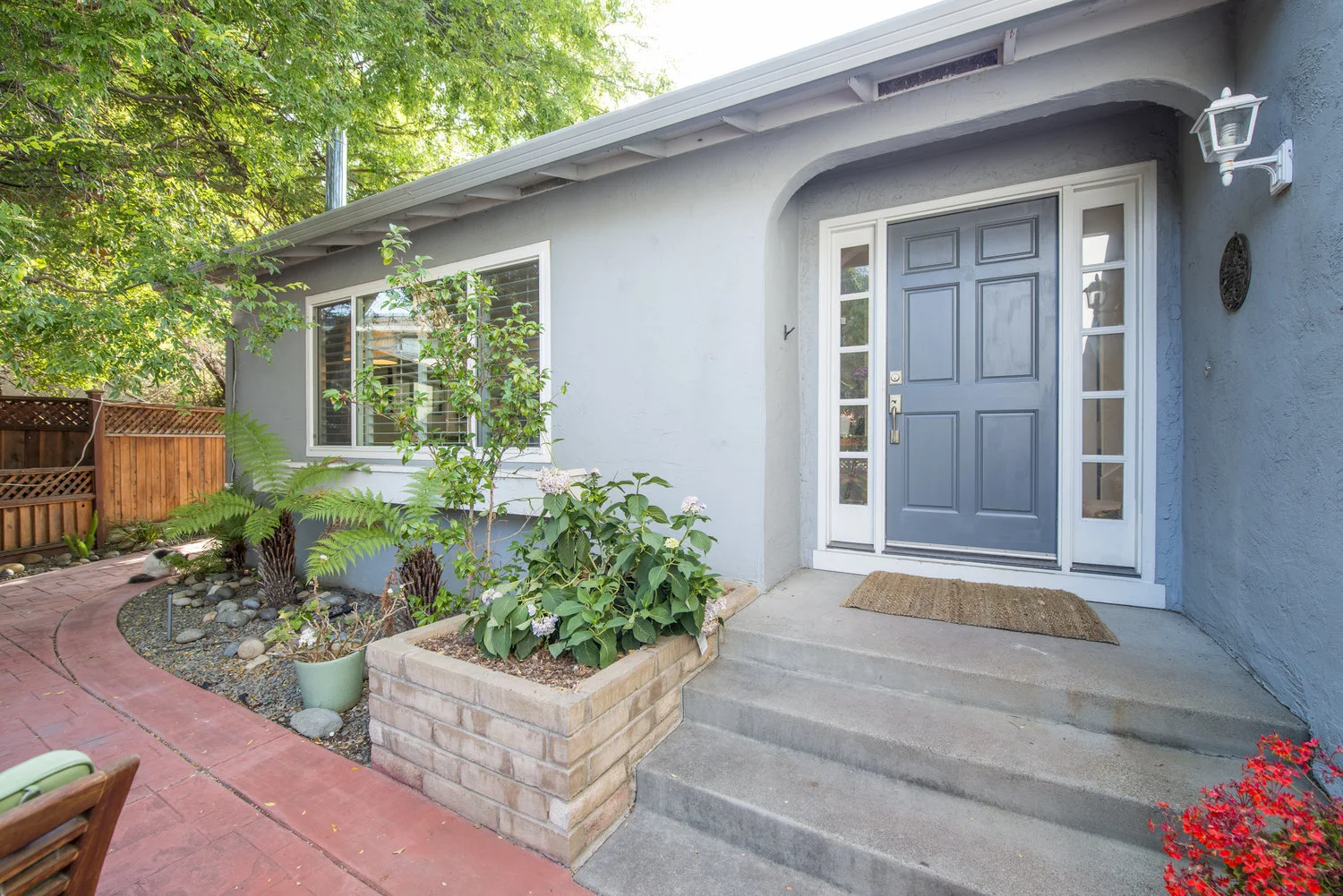 SUNNY AND BRIGHT In the Mission neighborhood of Fremont, this sunny, open home is perfect for entertaining inside and out - front, back and side yards - all year round! Great floor plan with a fireplace in the family room and a wood stove in the living room, skylights in the bright kitchen and large master bedroom and, no rear neighbors!