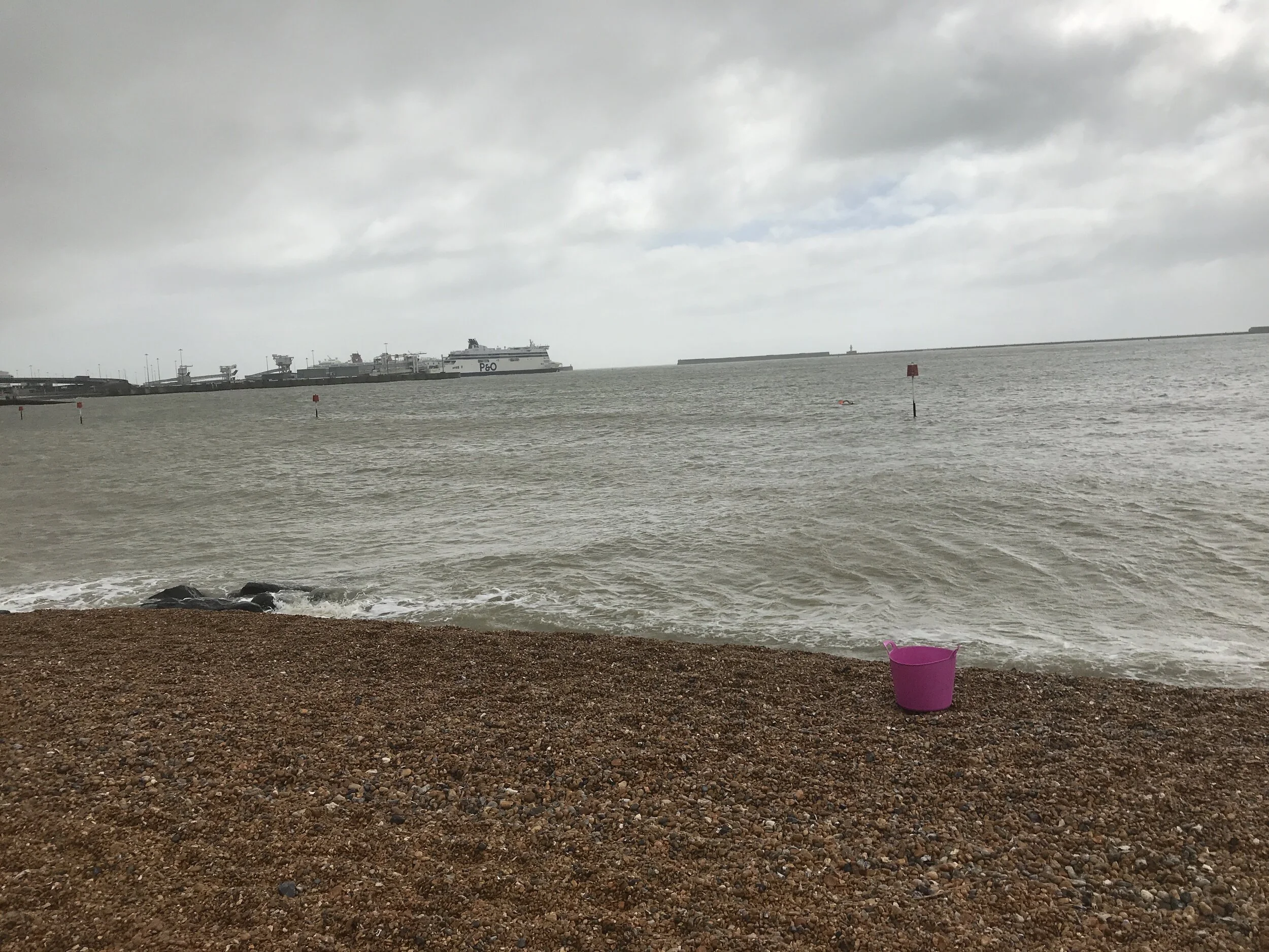 Clearer but bumpier - with our croc sanitising bucket brightening up the beach!