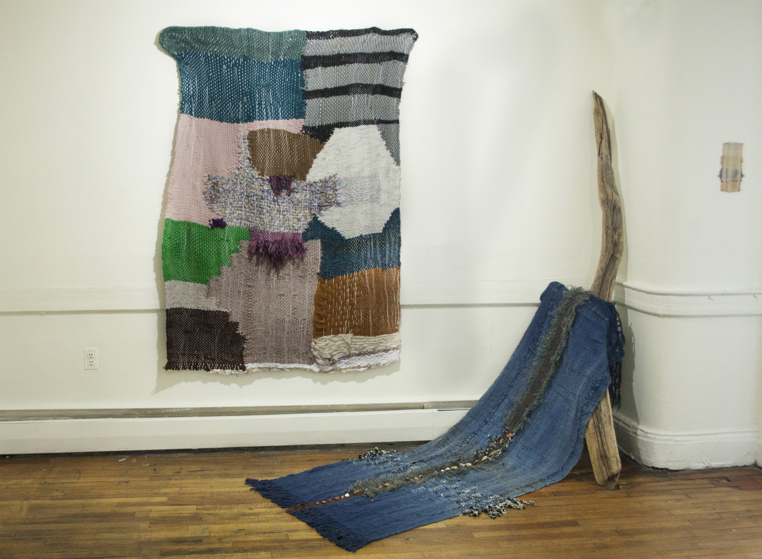   shield alternate   tapestry weaving 4.5x6'    big creek, high desert   hand weaving, burlap, indigo,&nbsp;rocks, driftwood 3x9’  
