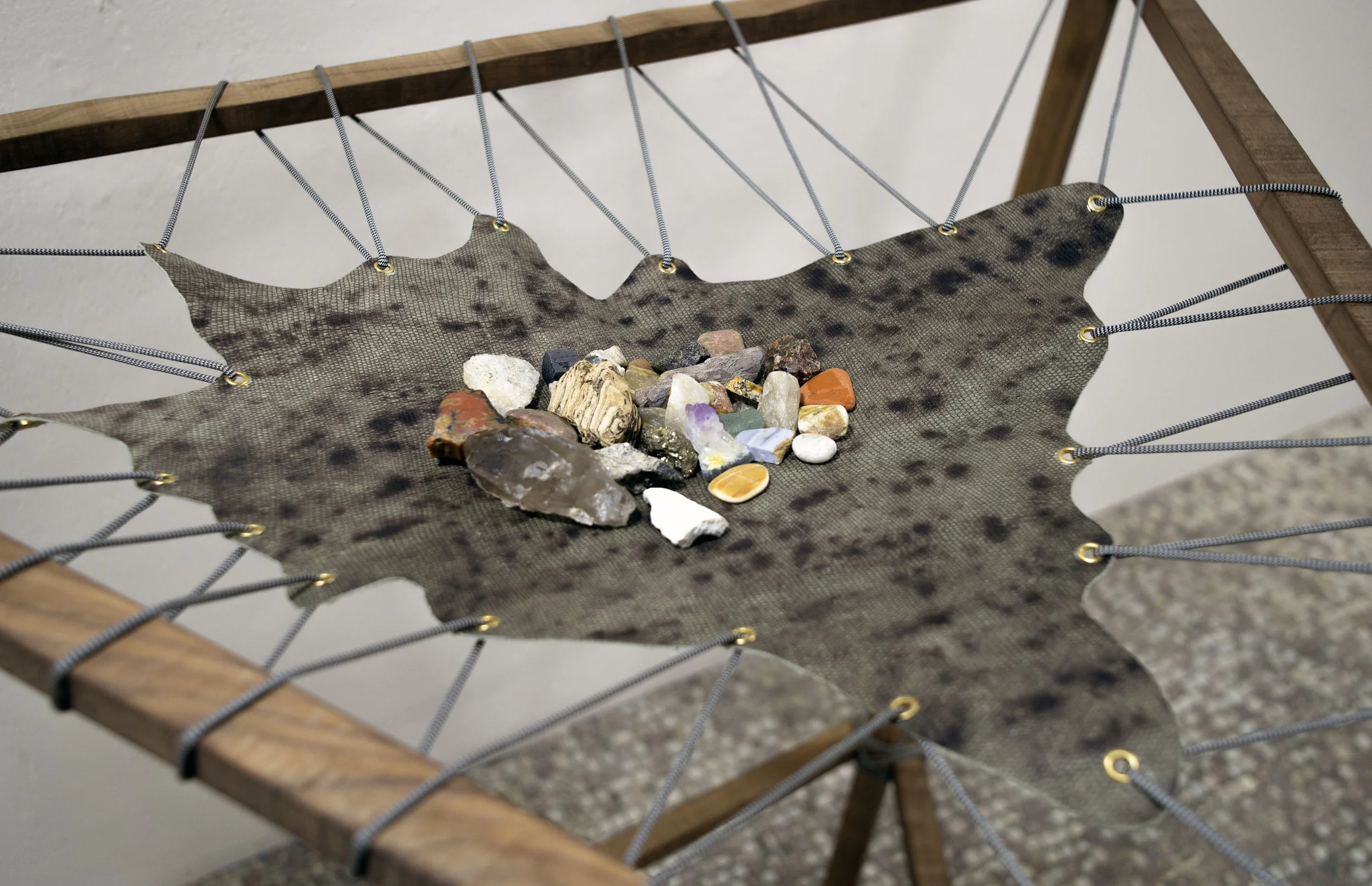 Neutral Ground (configuration 1) 3x4x6’ walnut, paracord, beloved rocks, smokey quartz, mystery hide, grommets I a part of the cosmic library II (missing information, currently being processed) III most rocks don’t ever get to go home