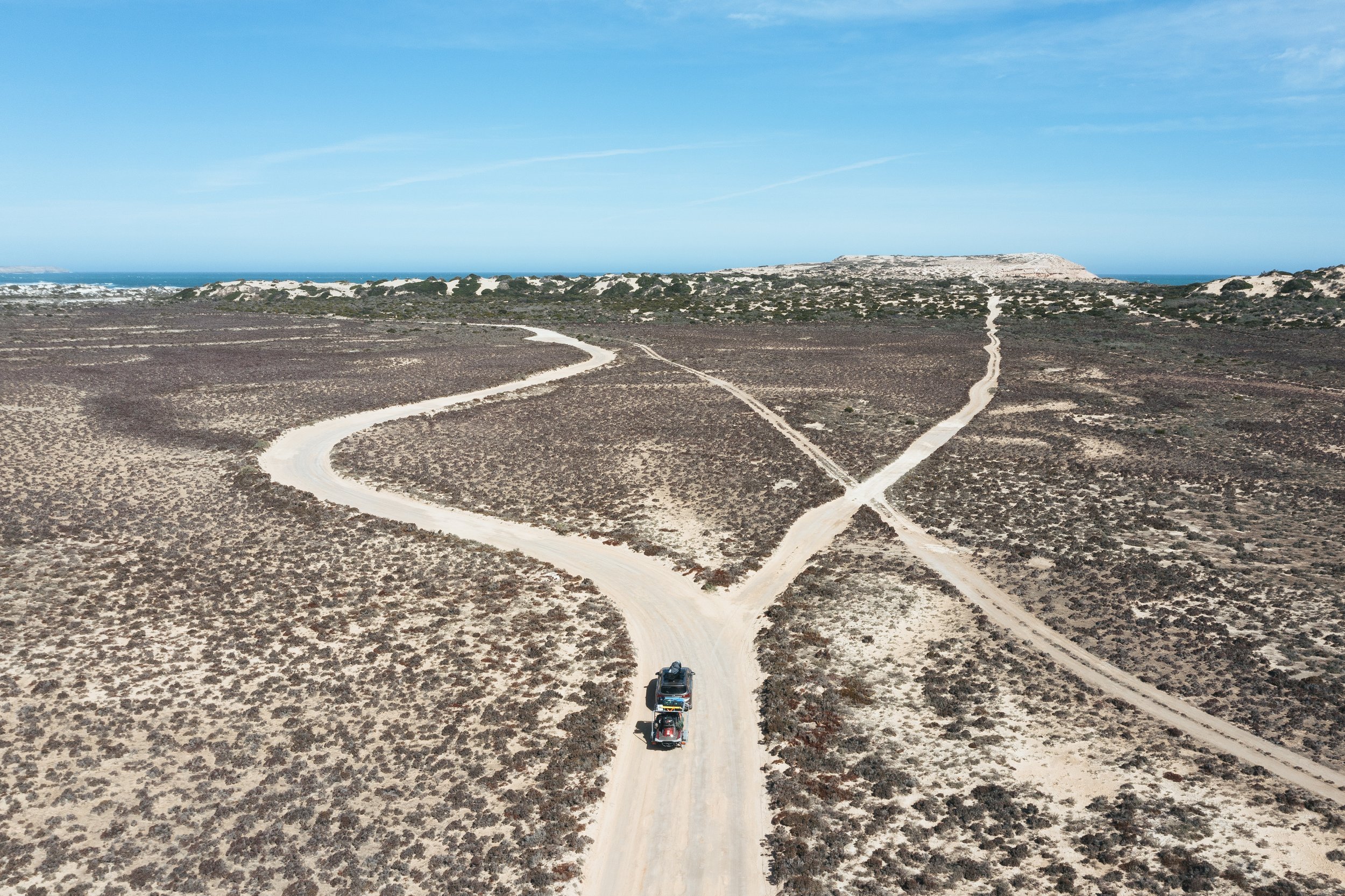 Lifestyle Image: Aerial photo of Laura Enever Driving in the Desert