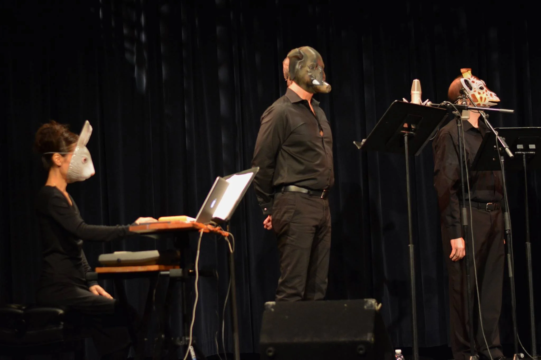 The performers wear animal masks to represent those who oppose the hummingbird in "Fire," the third song in And the Hummingbird Says: A Song-Cycle about Wangari Maathai, performed at the Compassion Arts & Culture and Animals Festival , October 21, 2017. Photo by Emily Lavieri-Scull — with Mihoko Suzuki , Steven Moore and Michael Steinberger .
