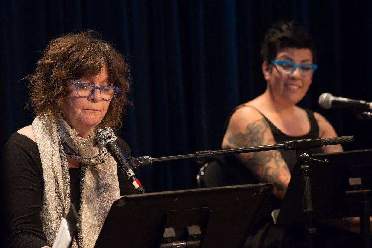Mariann Sullivan and Jasmin Singer , co-founders of Our Hen House , perform in "Sanctuary," by John Yunker, at the Compassion Arts & Culture and Animals Festival, October 22, 2017. Photo by Jo-Anne McArthur
