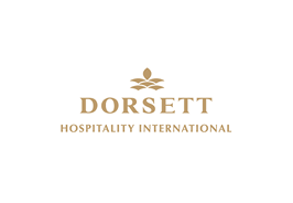 Dorsett Hospitality International logo with gold text and emblem on a white background.