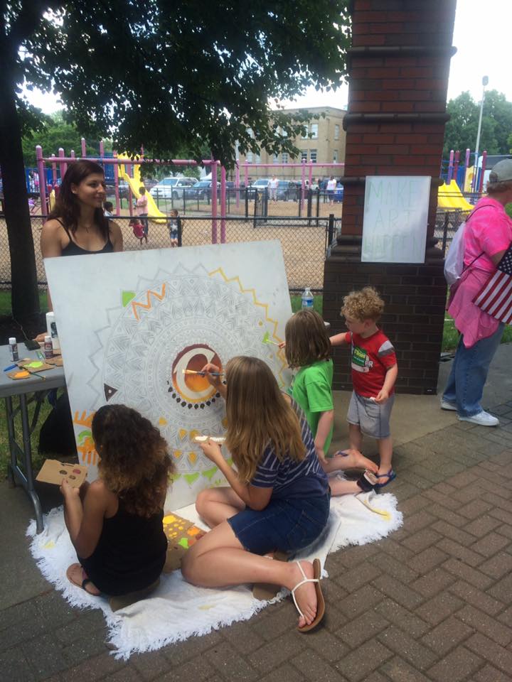 Artist Ly Canfield at the Firestone Park Community Celebration in June 2016.