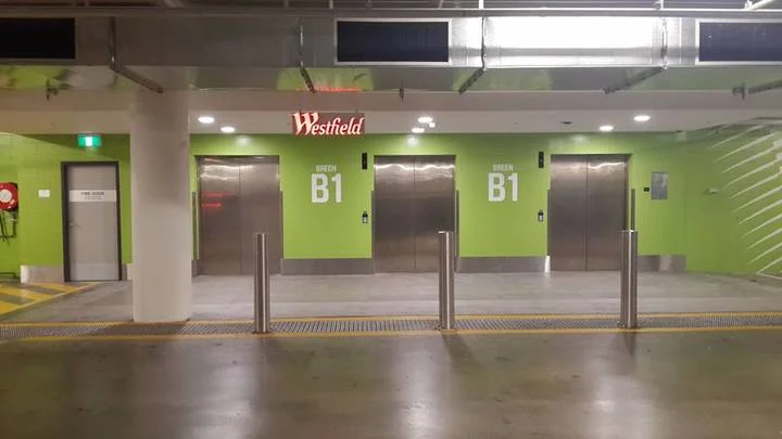 Park and take lifts to Level 1