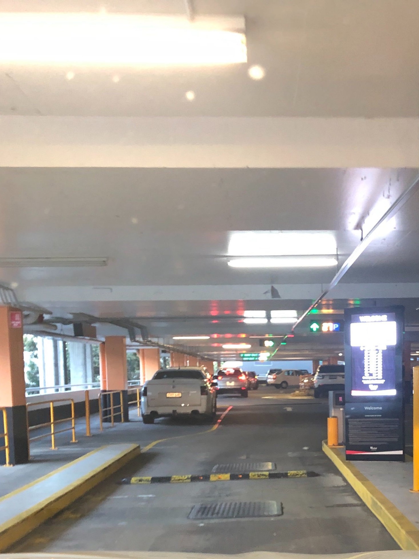 Enter the parking lot and on the right hand side there should be a ramp to upper level parking