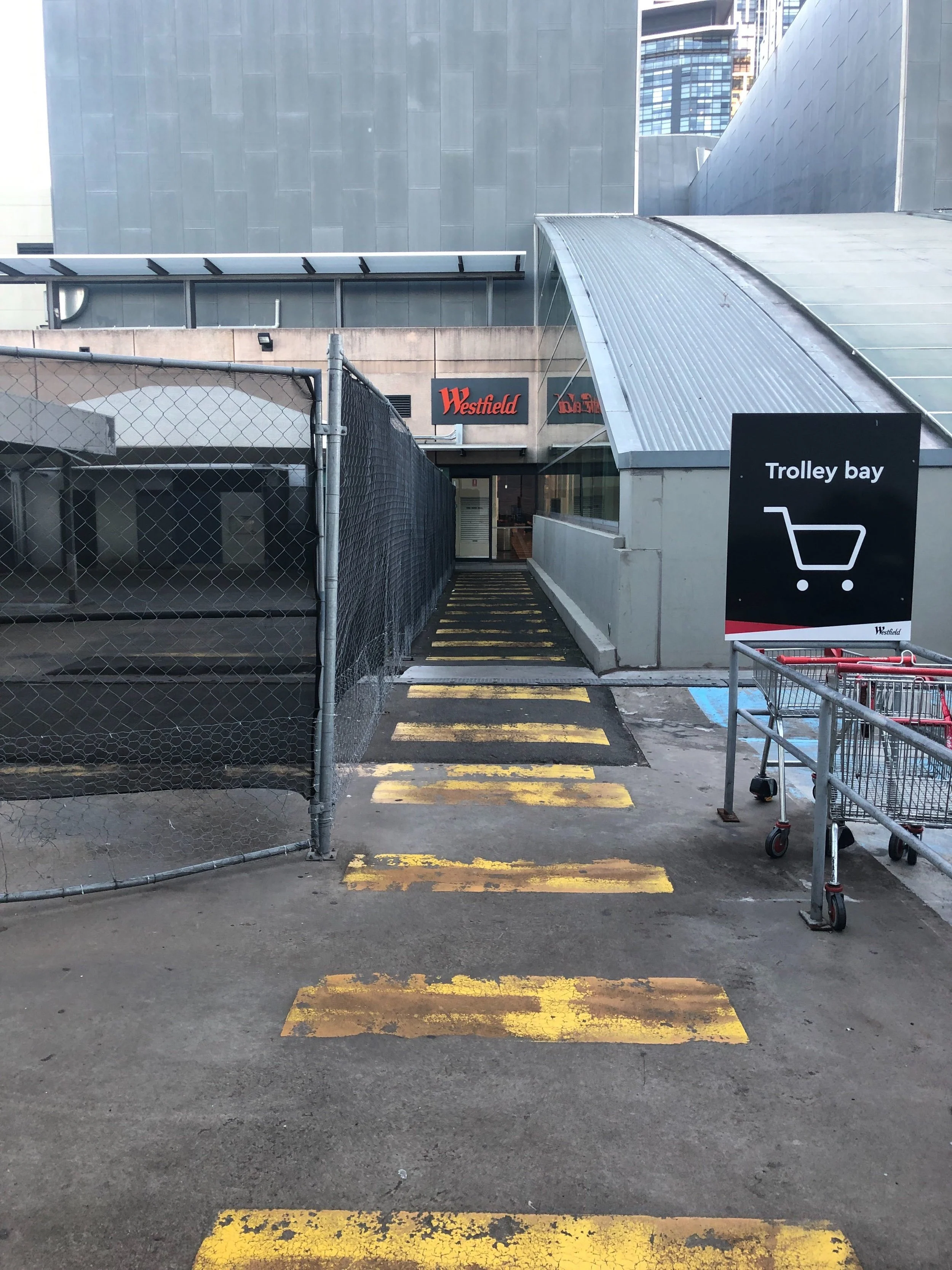 when you see the trolley bay, walk straight into the centre.