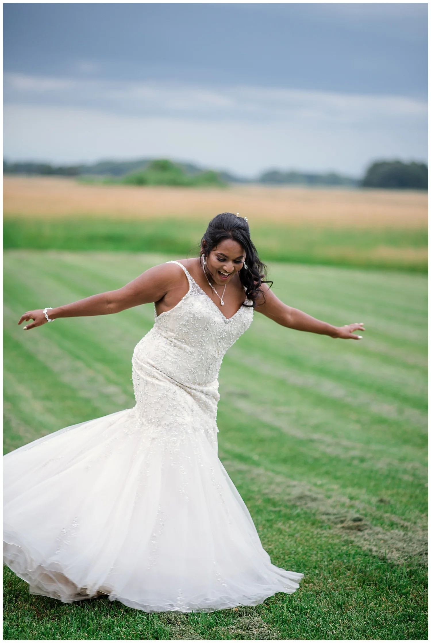 wisconsin bride, open field, summer wedding, white lace strapless wedding dress, diamond necklace, diamond earrings, diamond bracelet, badger farms wedding