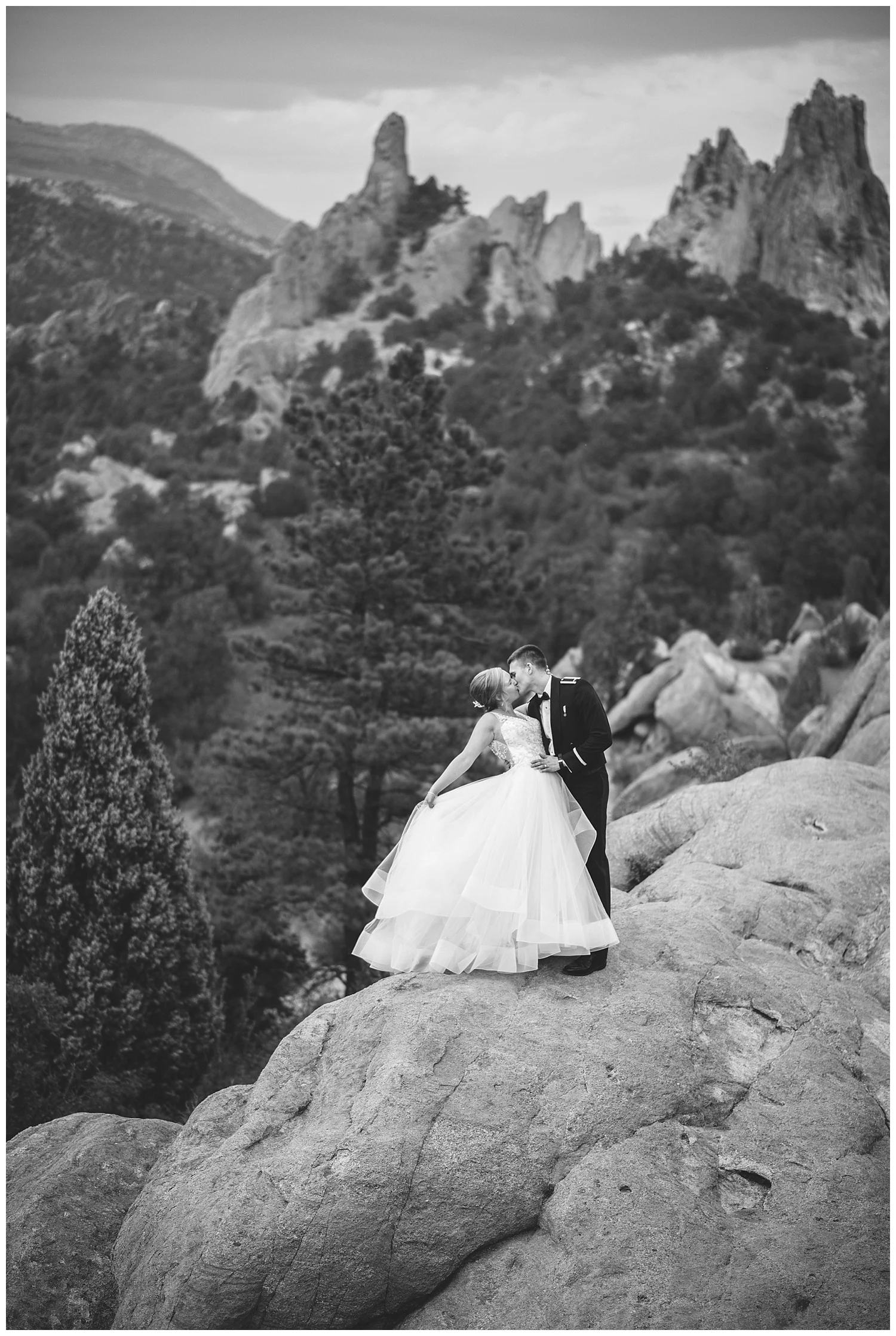Military Wedding, bride and groom, navy suit groom, dress blues groom, bridal party, romantic portraits at garden of the gods, bride and groom at garden of the gods, Colorado Wedding Photographer, Denver Wedding Photographer, Denver Elopement Photographer, Colorado Elopement Photographer, Rocky Mountain Wedding Photographer, Downtown Denver Photographer,