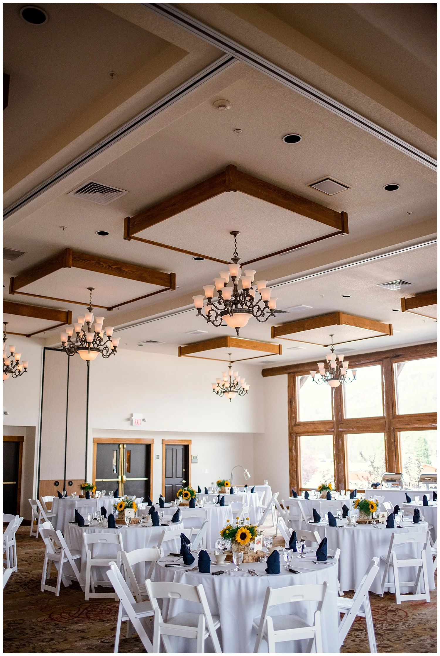 reception at estes park resort, sunflower decorations, rocky mountain elopement photographer, rocky mountain wedding photographer, colorado wedding photographer, Estes Park wedding photographer