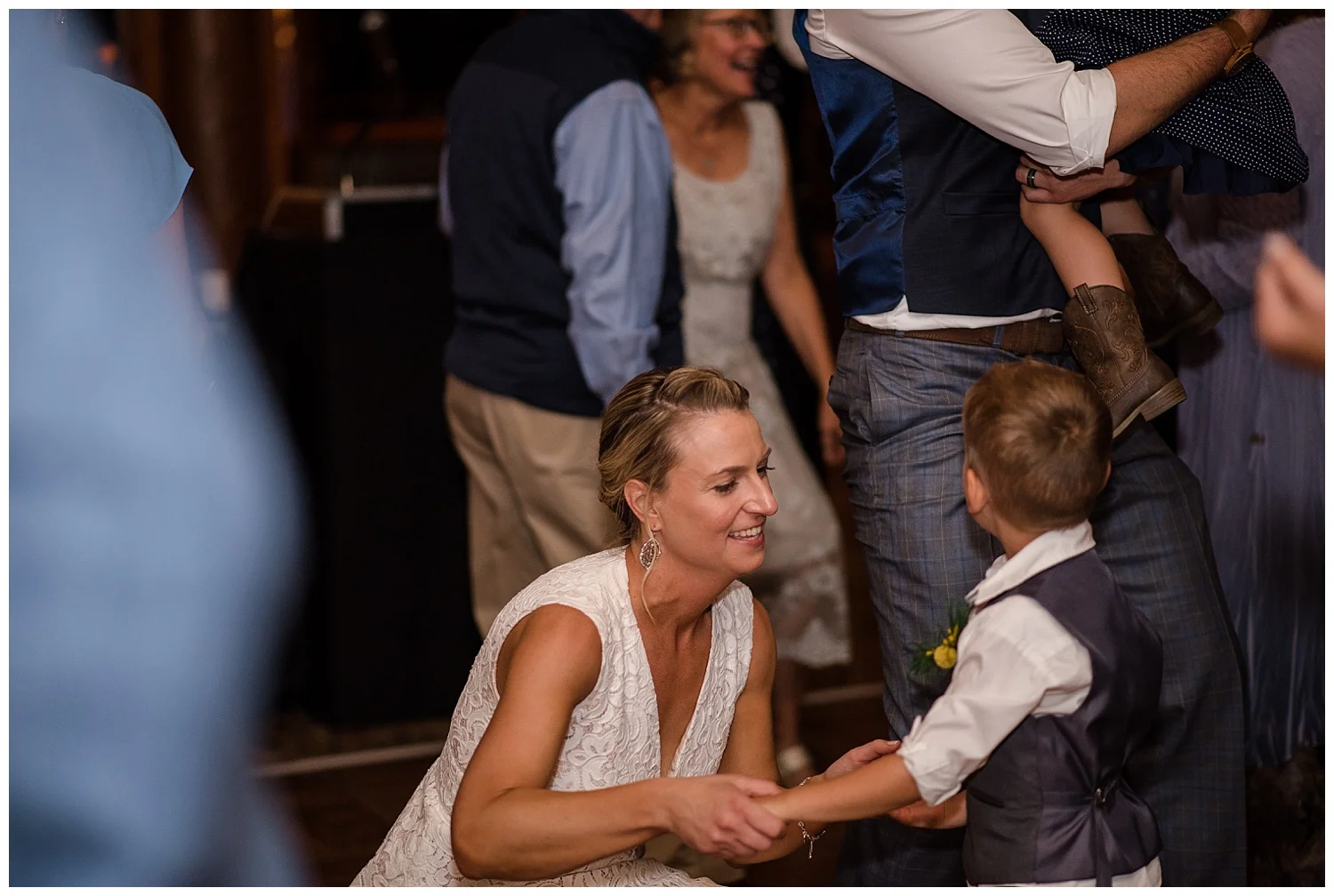 wedding guests dancing at estes park resort, rocky mountain elopement photographer, rocky mountain wedding photographer, colorado wedding photographer, Estes Park wedding photographer