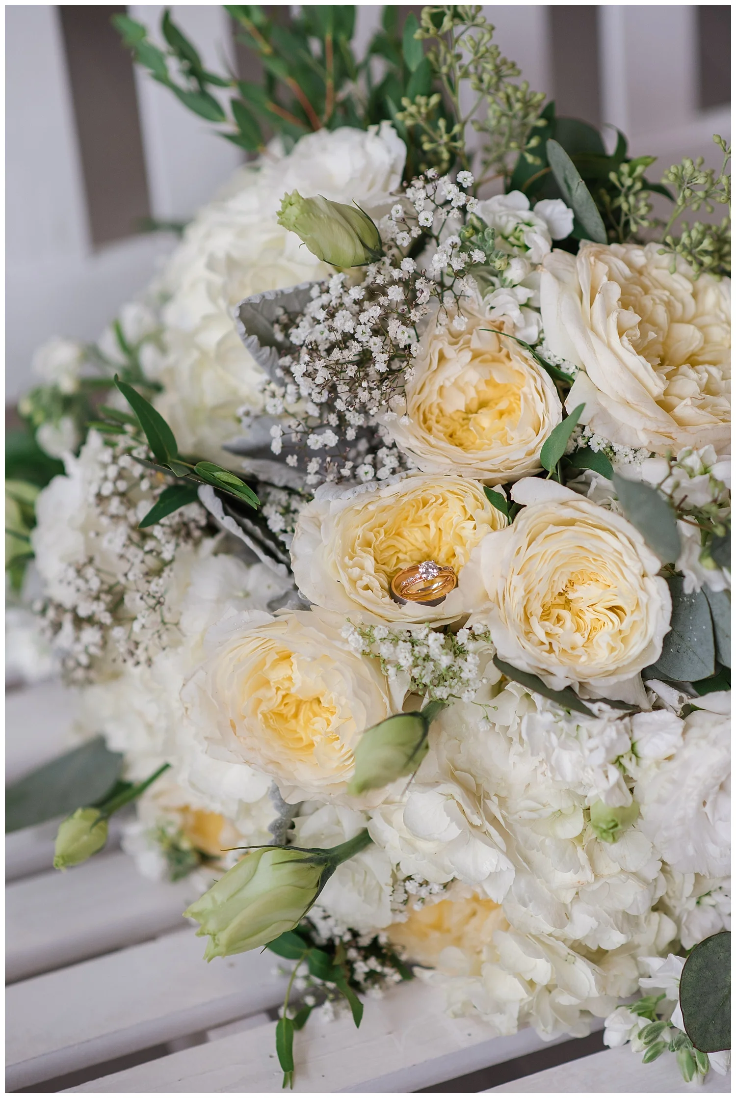 Yellow and green floral details at wedding in the barn at raccoon creek, colorado wedding photographer, denver wedding photographer, colorado elopement photographer,
