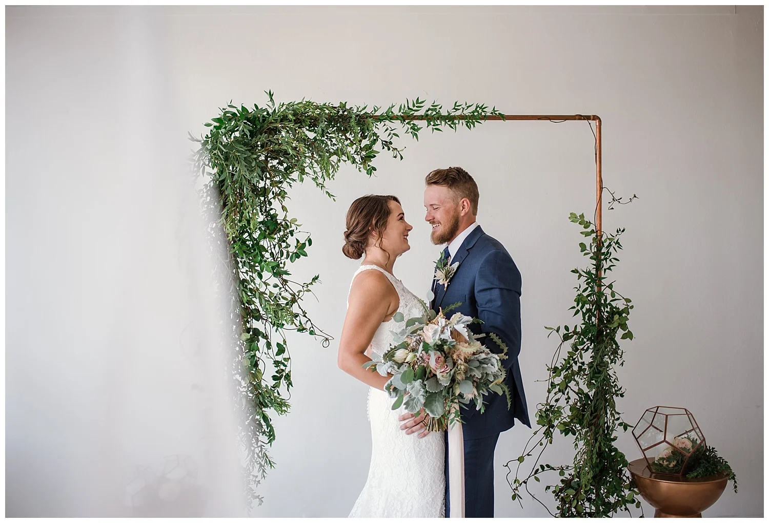 bride and groom portraits in a metal tones and pink wedding, eucalyptus wedding decor, downtown denver wedding photographer, estes park wedding photographer, colorado wedding photographer,