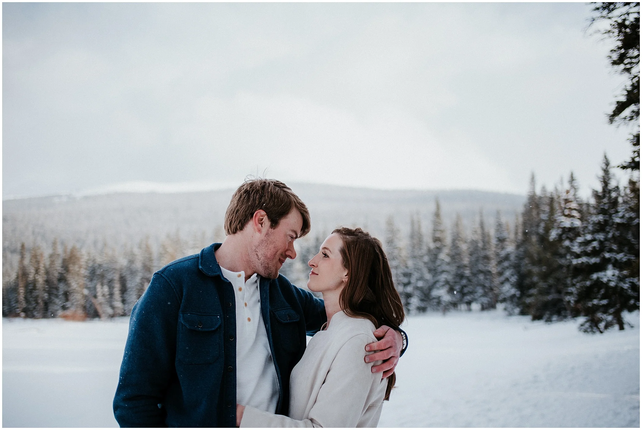 Echo Lake Engagement Session, Denver Engagement, Colorado Engagement Photos, Denver Engagement Photos, Colorado Engagement Photographer, Denver Engagement Photographer, Colorado Videographer, Denver Videographer, Mountain Engagement Photos, Engagement photo outfit ideas, Forest Engagement session, brunette bride, winter engagement, winter wedding, small wedding, forest photos denver, mountain view engagement colorado, romantic engagement session, engagement poses, dog engagement photos, Echo Lake,