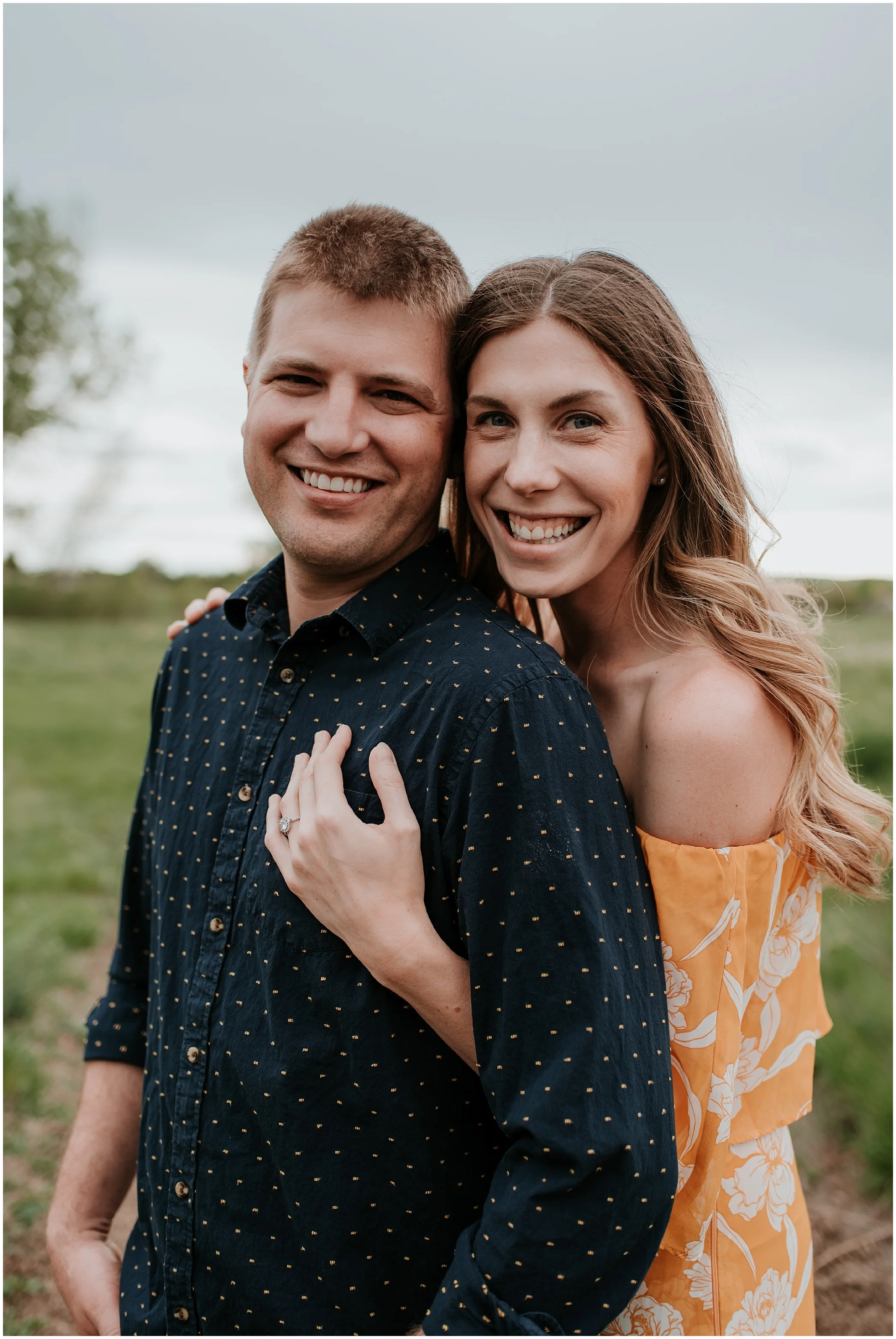 Denver engagement photos, colorado engagement photos, denver engagement photographer, lakewood engagement photo locations, floral dress engagement, engagement photo ideas, best engagement photographers denver, colorado wedding photographer, denver wedding photographer, denver wedding videographer, happy engagement photos, engagement photo posing, halo engagement ring,