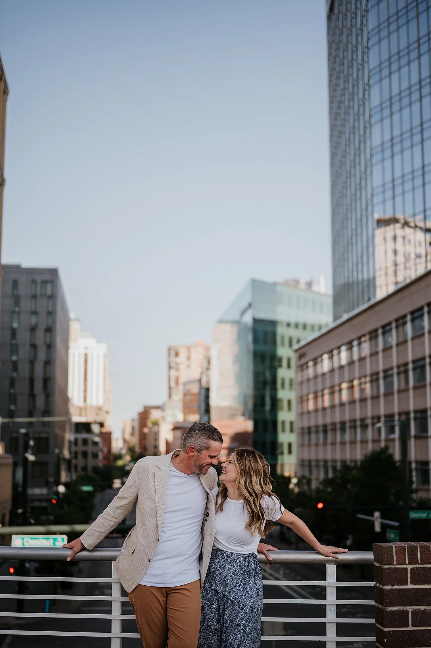Do You Need a Film or Photography Permit in Denver, couple taking photos downtown denver, denver engagement photographer, colorado wedding photographer, denver elopement photographer, colorado wedding photographer, colorado elopement photographer
