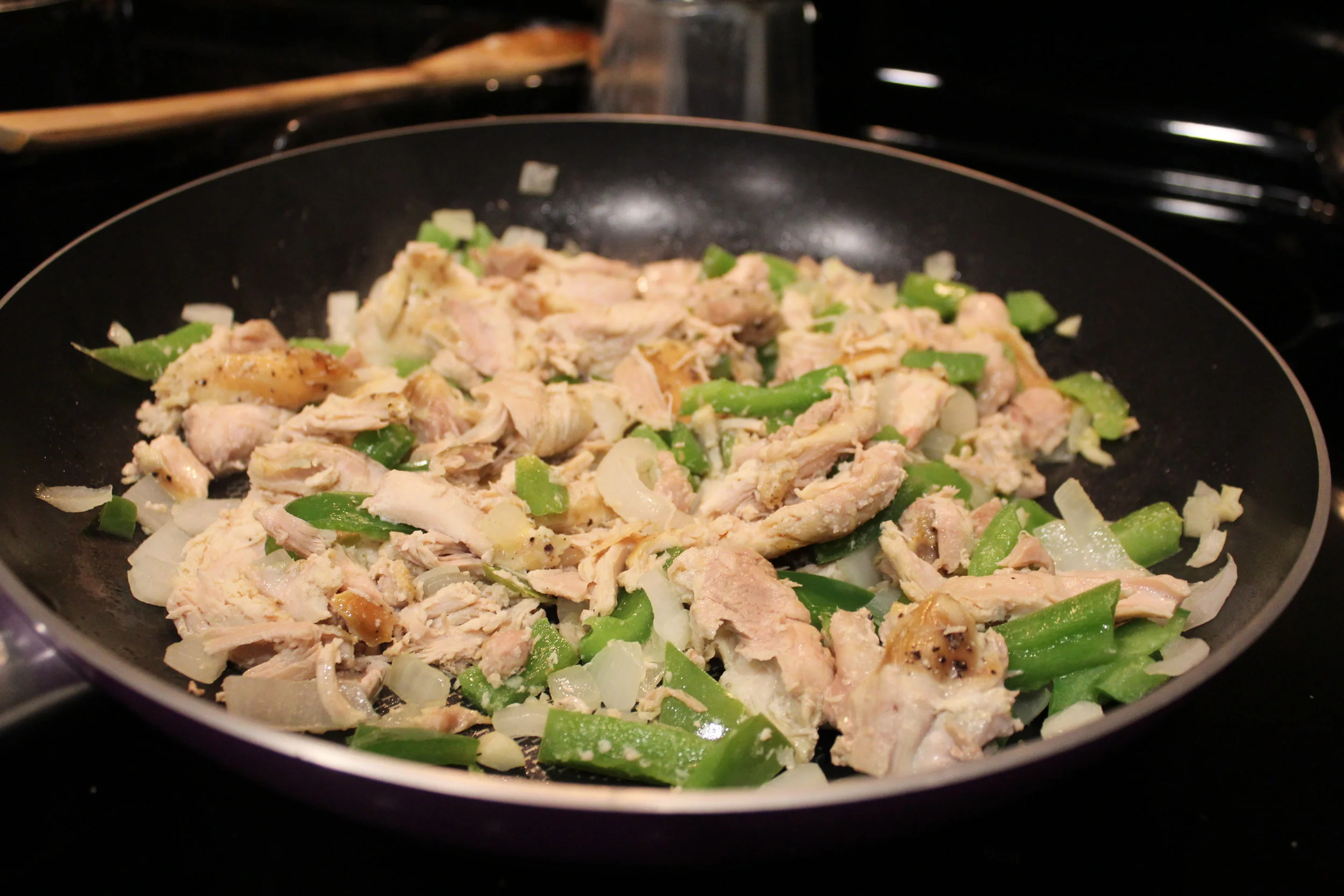 Toss in the meat - I went ahead and crockpotted the chicken thighs, but you can dice up the chicken or brown ground turkey on the stove top.