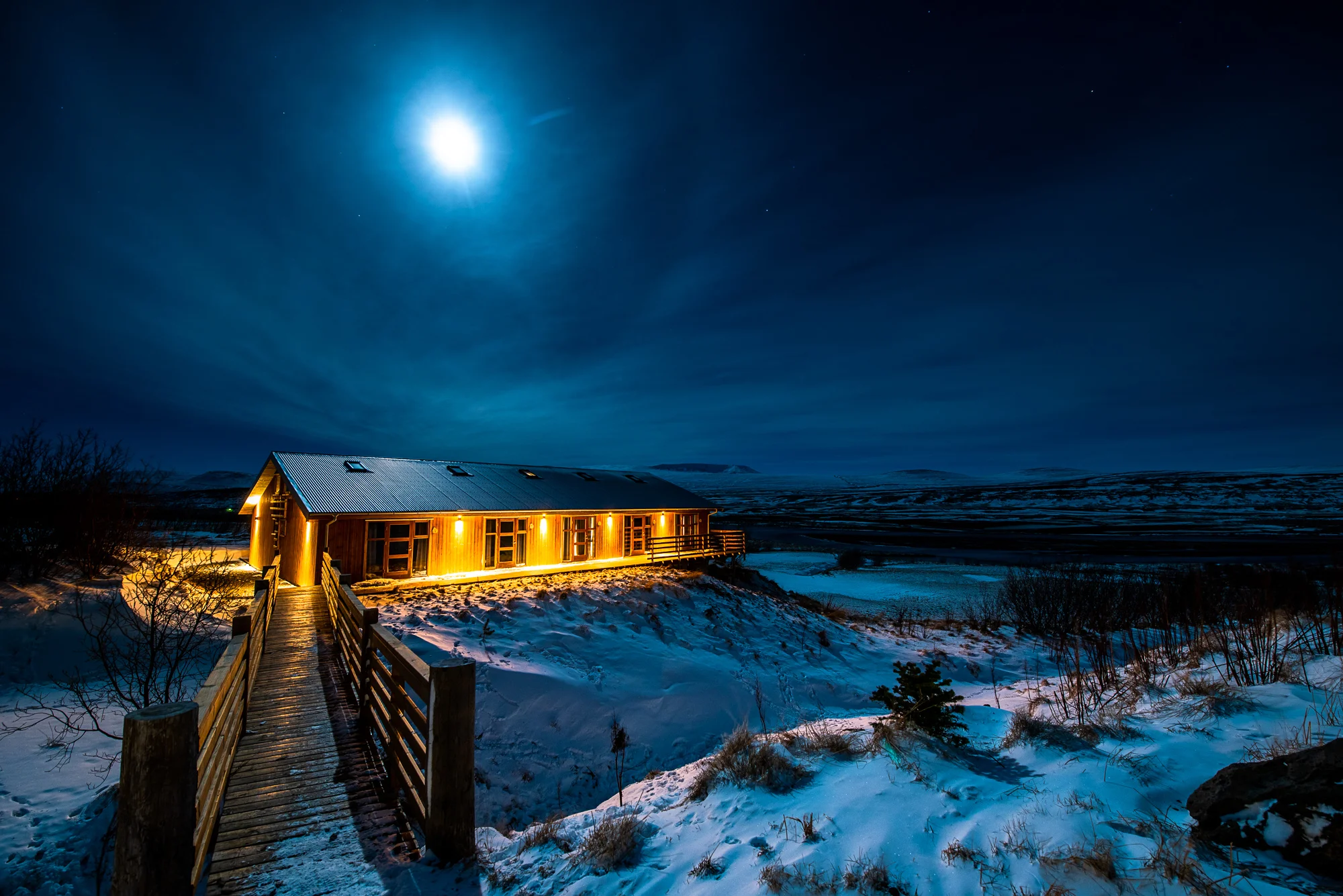 Our beautiful warm log cabin nestled in the icy cold snow of the Iceland Winter Wonderland.