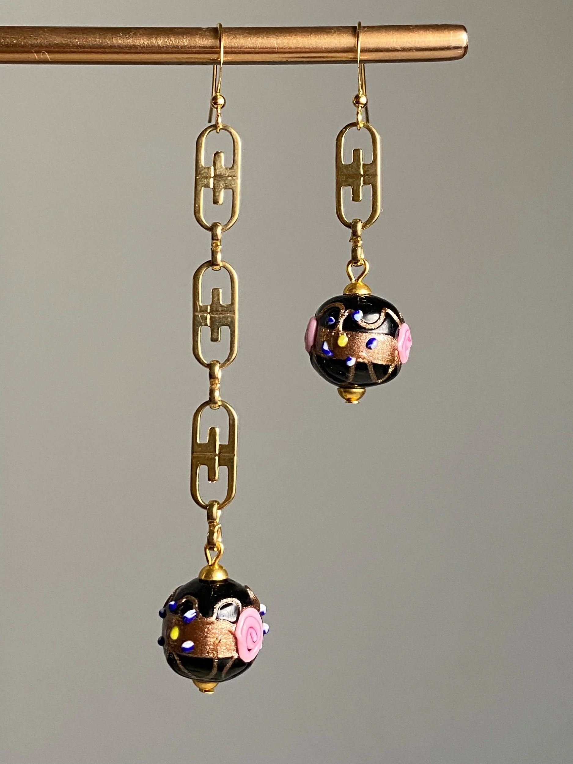 Odd gold black earrings