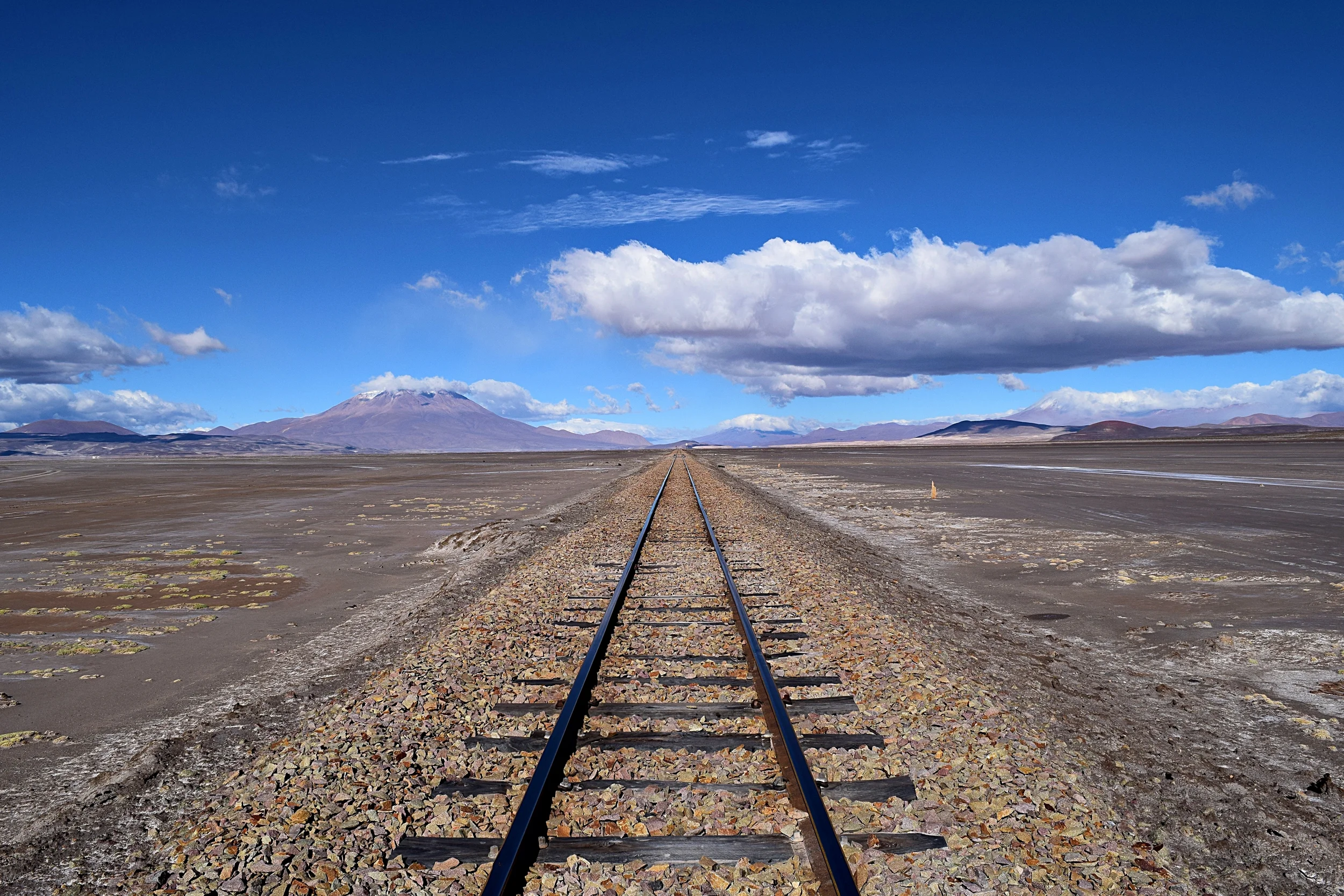 A railroad splits the border between Bolivia and Chile. Bolivia is currently in an 80-year war against Chile to take back the land that originally belonged to them.