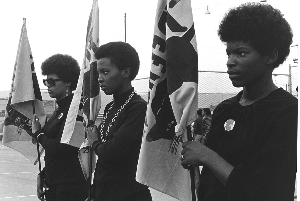black+panthers+dogwoof+documentary+#1+Women+drilling+with+Panther+flags.+Photo+courtesy+of+Pirkle+Jones+and+Ruth-Marion+Baruch..jpg