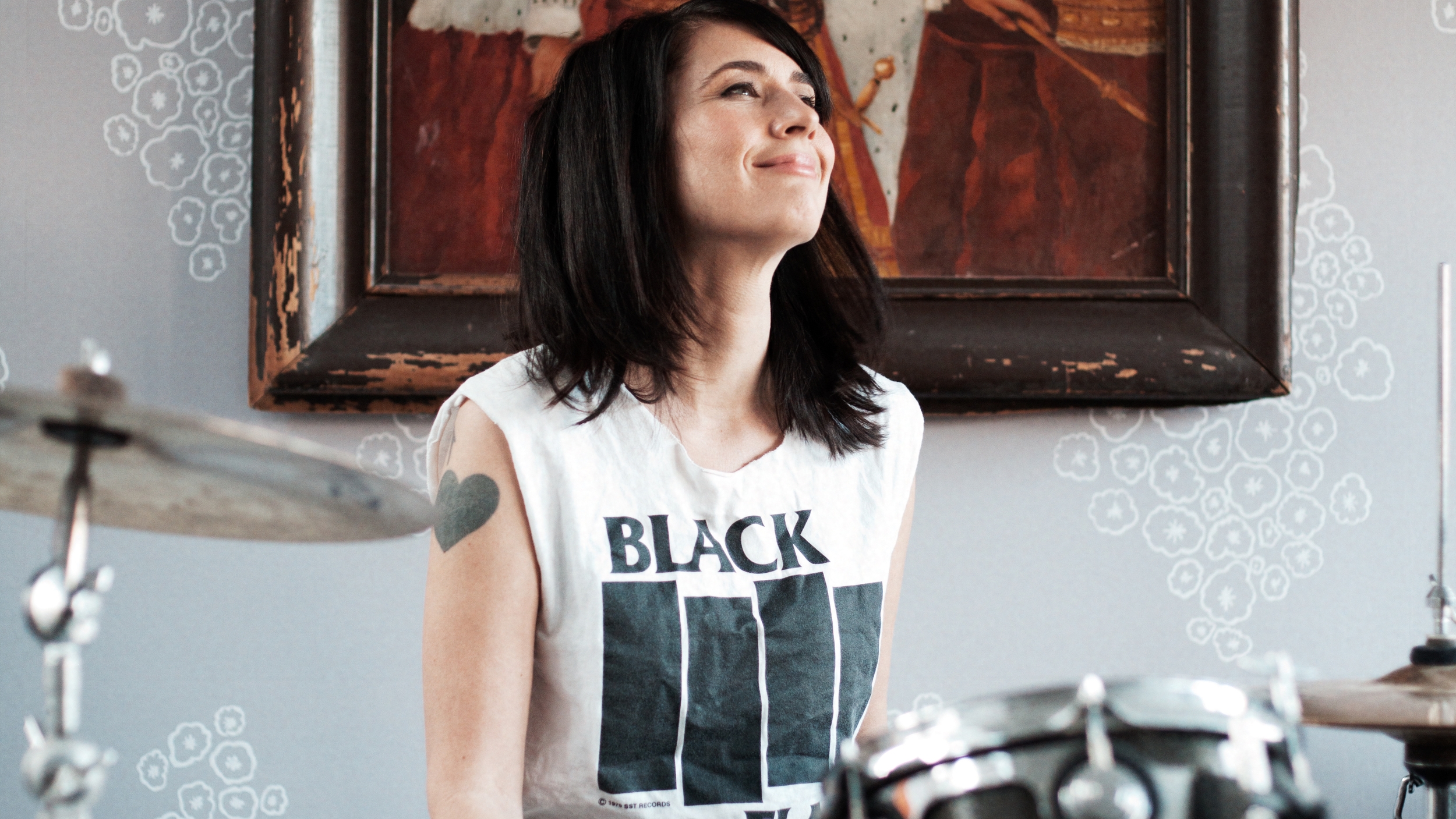 #3 - Kathleen Hanna playing the drums. Photo courtesy of Allison Michael Orenstein.jpg