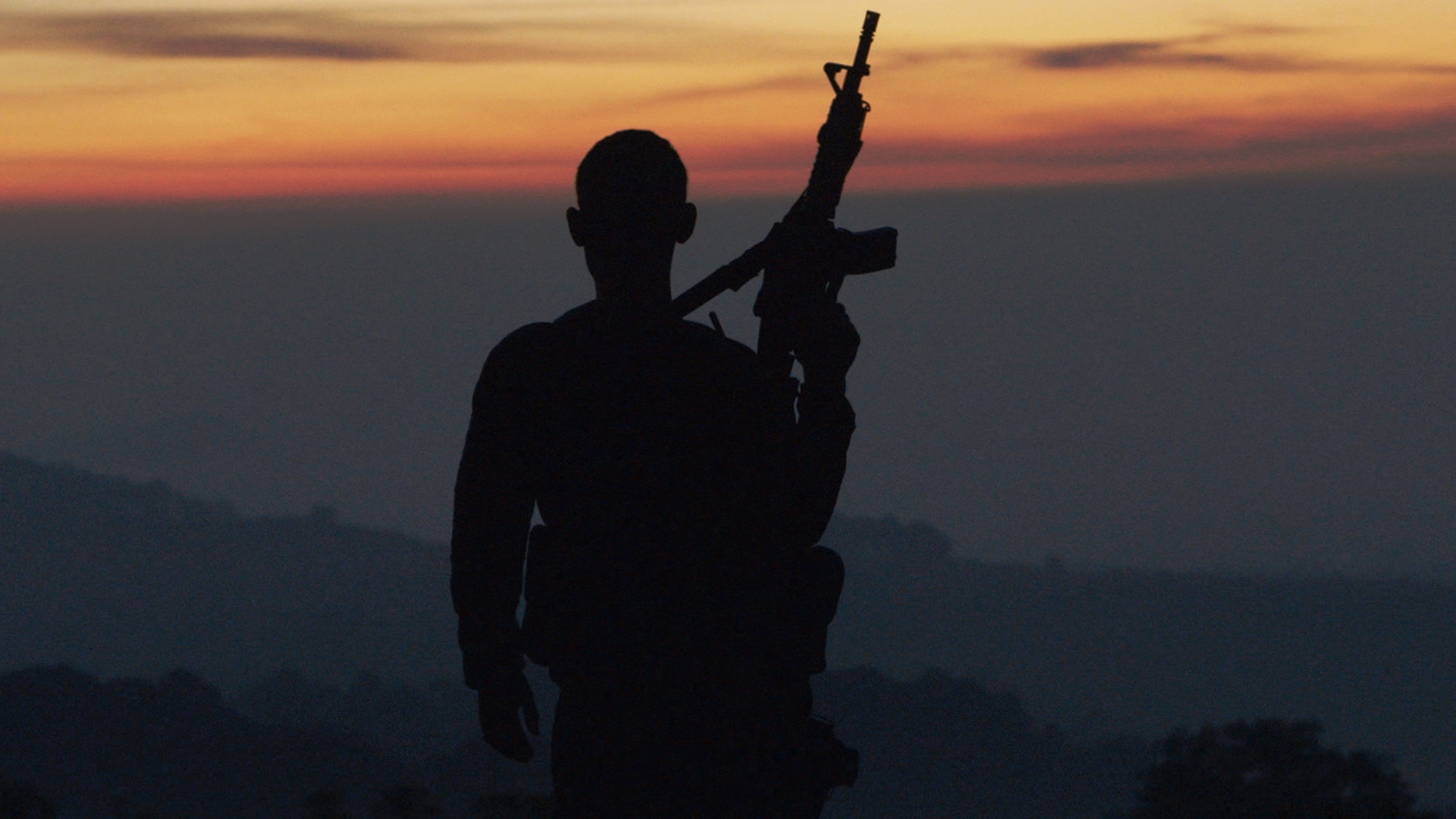 #1 - Autodefensa member standing guard in Michoacán, Mexico, from CARTEL LAND, a film by Matthew Heineman.jpg