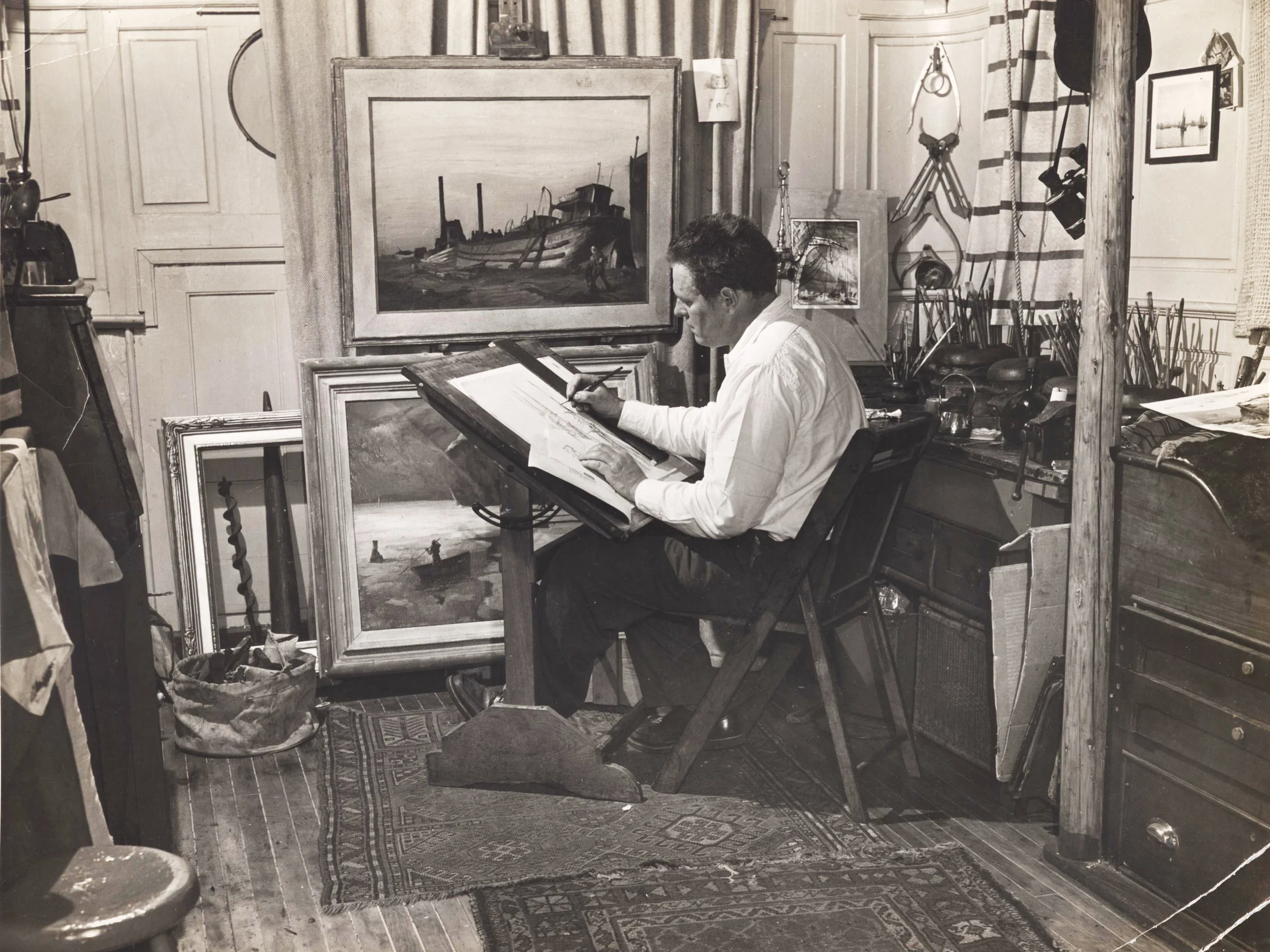 Frank Rino (dates unknown), Noble aboard the houseboat studio, Photograph, 1948, Reprinted from the original photographs in the New York Journal American , The Noble Maritime Collection 
