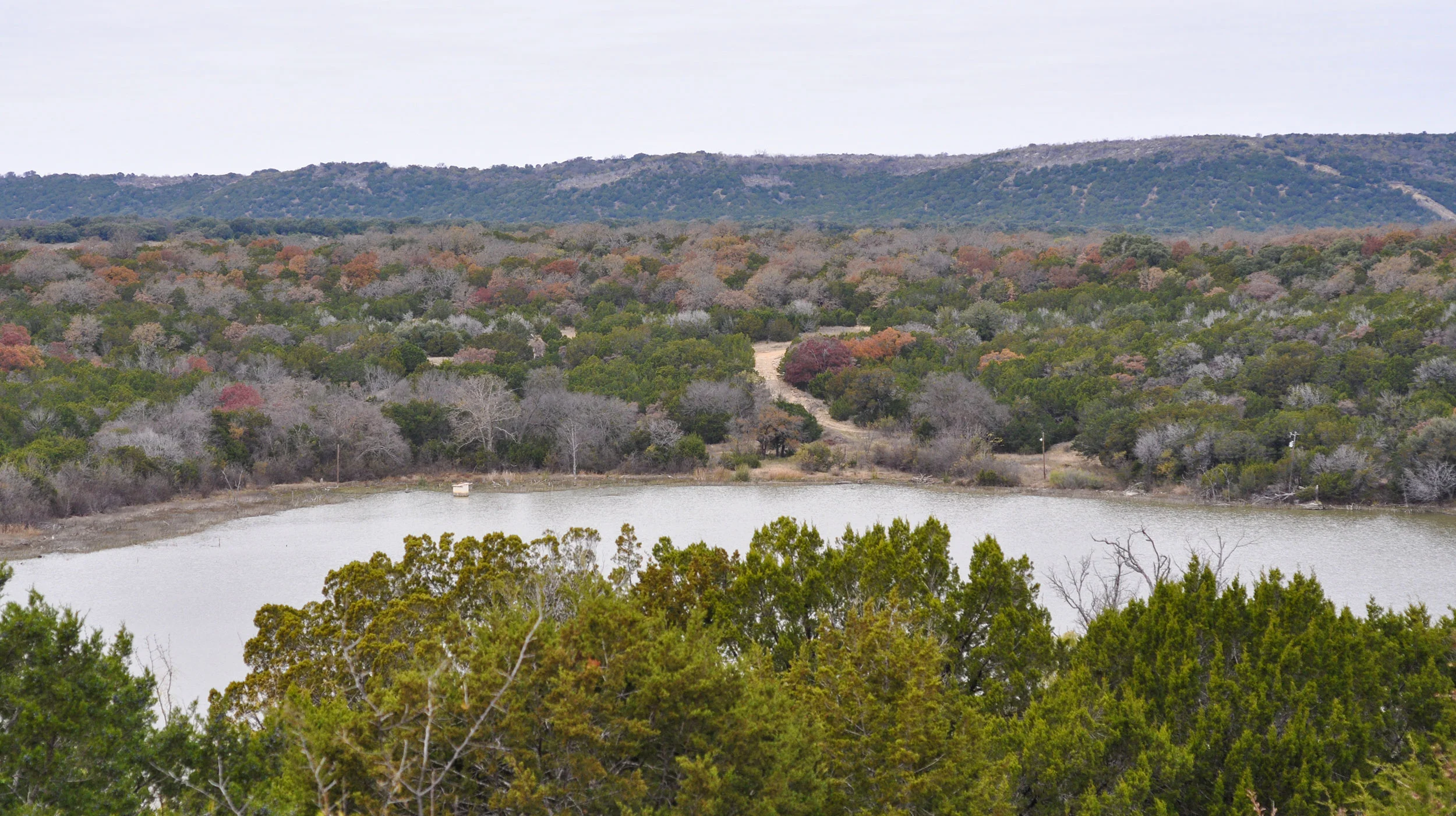 Palo Pinto State Park Strawn, Texas Studio Outside is working with Bennet Benner Partners Architects in the development of a new state park for the Texas Parks and Wildlife Department. Located two hours west of Fort Worth, Palo Pinto Mountains claims the transition between the cross timbers and the plains of west Texas. This rugged site will provide a great array of recreational and interpretive experiences including canoe & kayak, horseback riding, hiking, and a specifically designed astronomy venue. Lodging will provide a hierarchy of accommodations that range from group cabins to tents and RV’s to rustic back country tent camping. The highlight of the park experience is Russell Creek and Tucker Lake watershed — landforms that create dramatic ridgeline vistas and intimate creek experiences. As a core destination in the Texas State Parks Centennial Plan, this new park seeks to engage visitors with a broad appreciation of water conservation, natural habitat exploration, and dynamic recreational opportunities. Client: Texas Parks & Wildlife Department Project Partner: Bennet Benner Partners Architects Photographer: Raylen Worthington