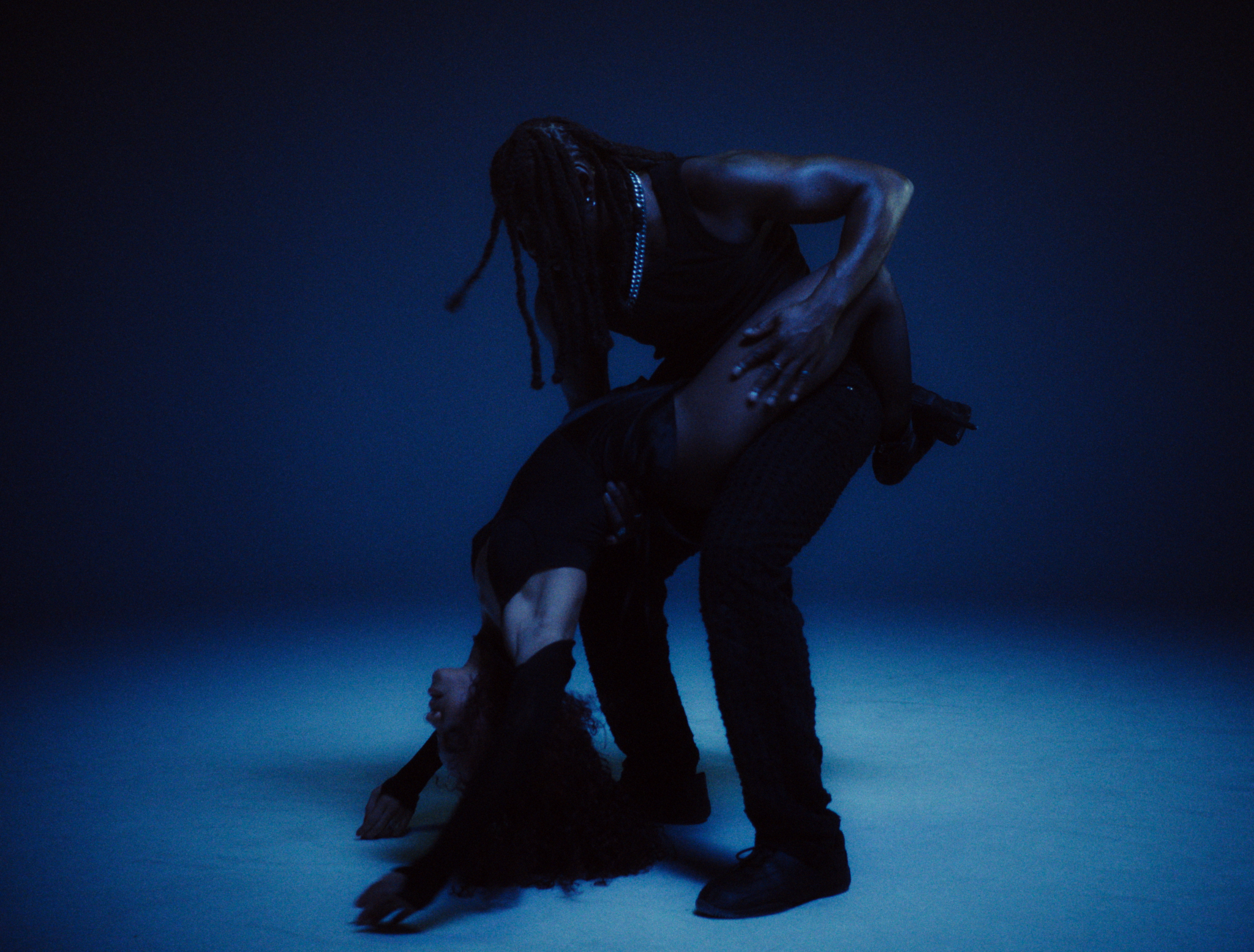 Leigh-Anne Pinnock performing choreography on set of a music video