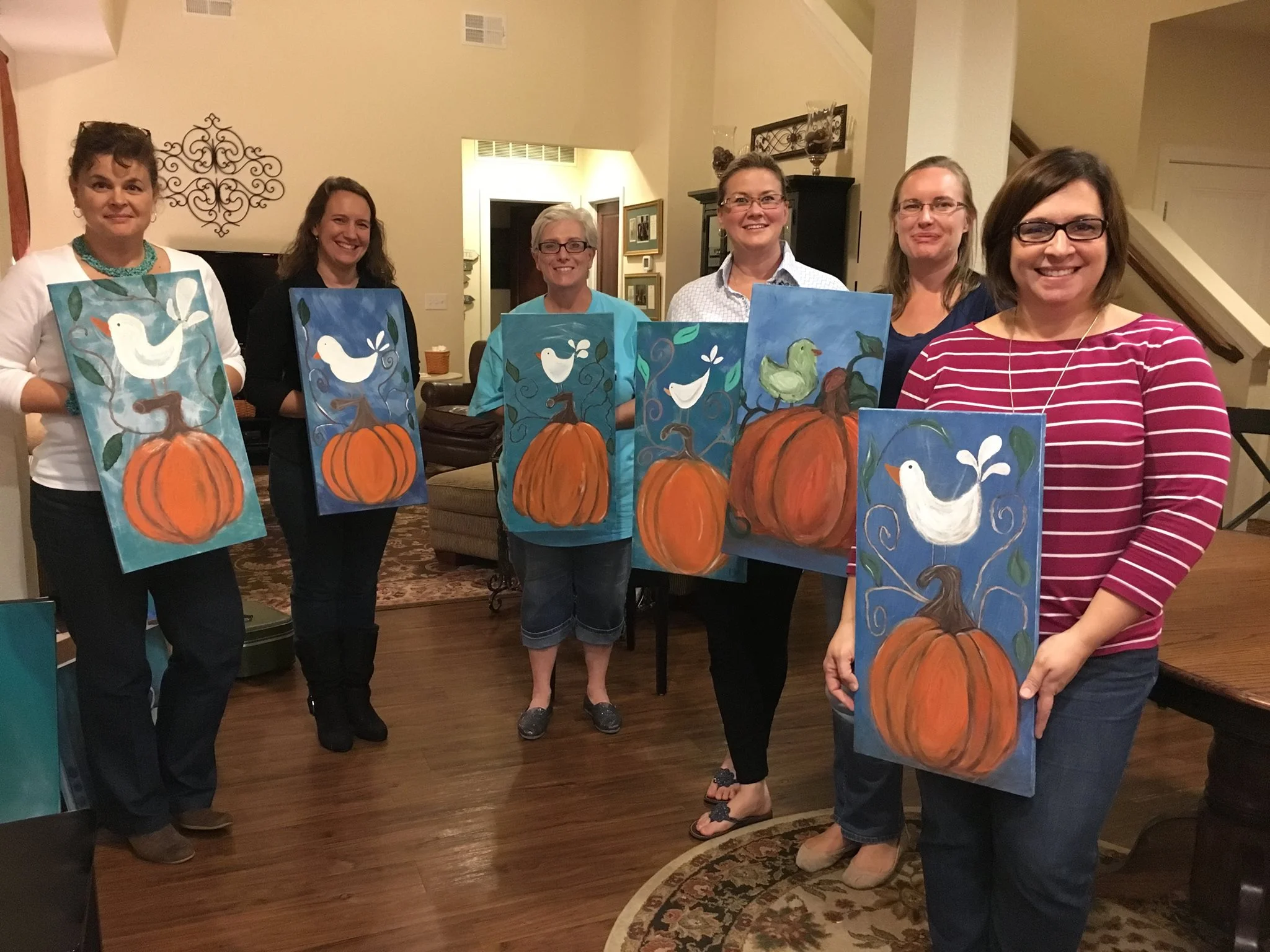 These lovely military wives did not think they could "paint or create". HOWEVER, they all accomplished a Masterpiece. We had so much fun, we laughed about "nice bottoms" (on our pumpkins!) and relieved some stress, had a sip or two of wine and just enjoyed life! Gigi P. hosted the event and she scheduled her second gathering and had a blast again the following month! Thank you ladies for a great time!