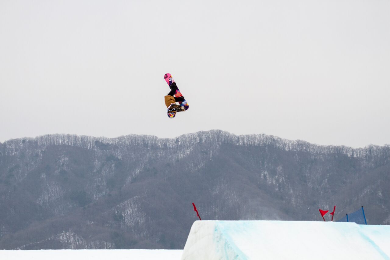 Photo - Jenny Bletchler. Snap shot from the TEST! Cab Underflip Nose grab.
