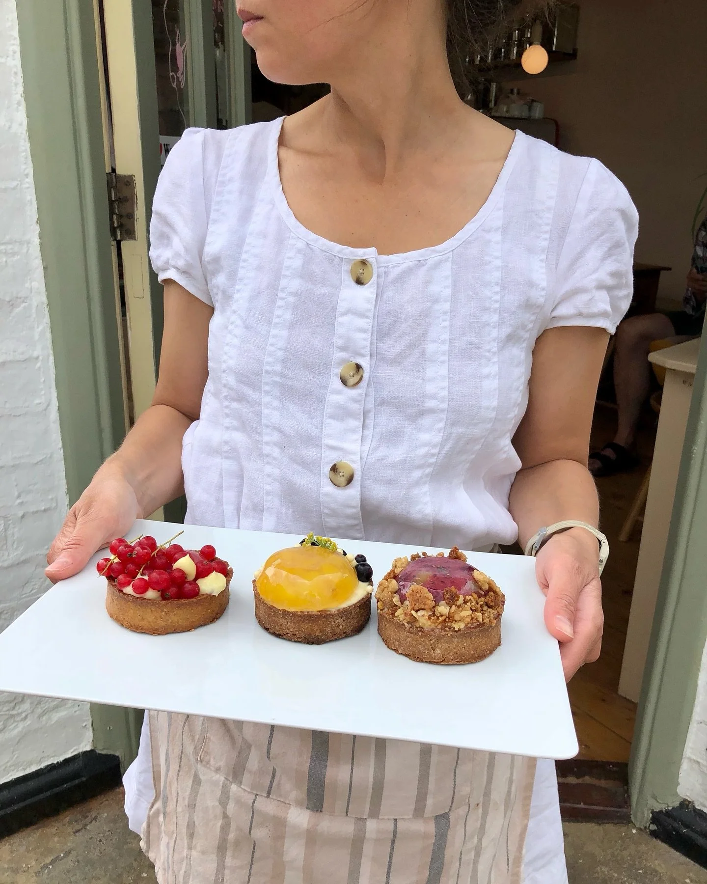 Tarts and Kata.

Tarts are
🍈gooseberry crumble
🍍 pineapple - blackcurrant white chocolate
🍓 strawberry custard and redcurrants.

📍shutishuti patisserie is sitting room size bakery serving seasonal cakes, tarts, savoury pastries along with @harmon