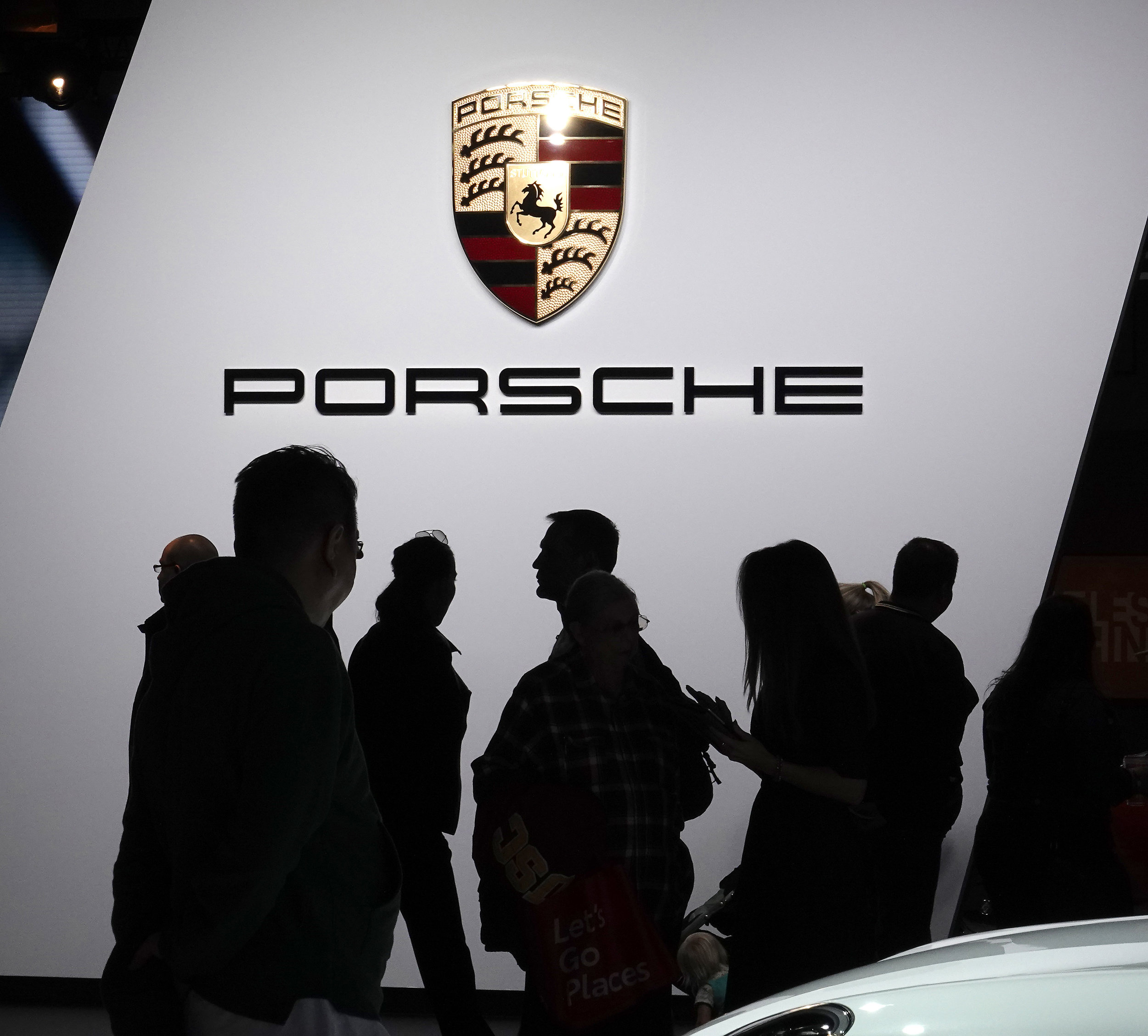  Porsche showroom at the Los Angeles Auto Show had large crowds. 
