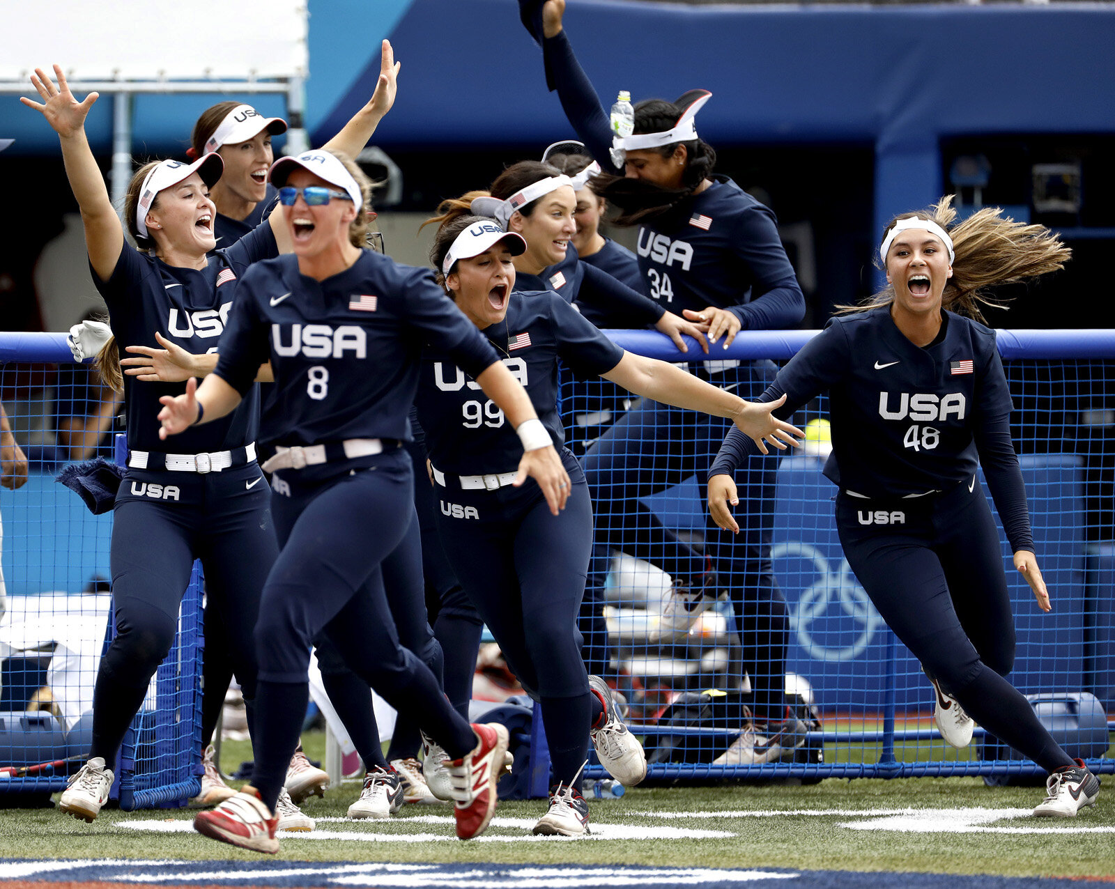  U.S. softball players go crazy after Kelsey Stewart hit a walk-off homer beating Japan in a preliminary game during the 2020 Tokyo Olympics. 