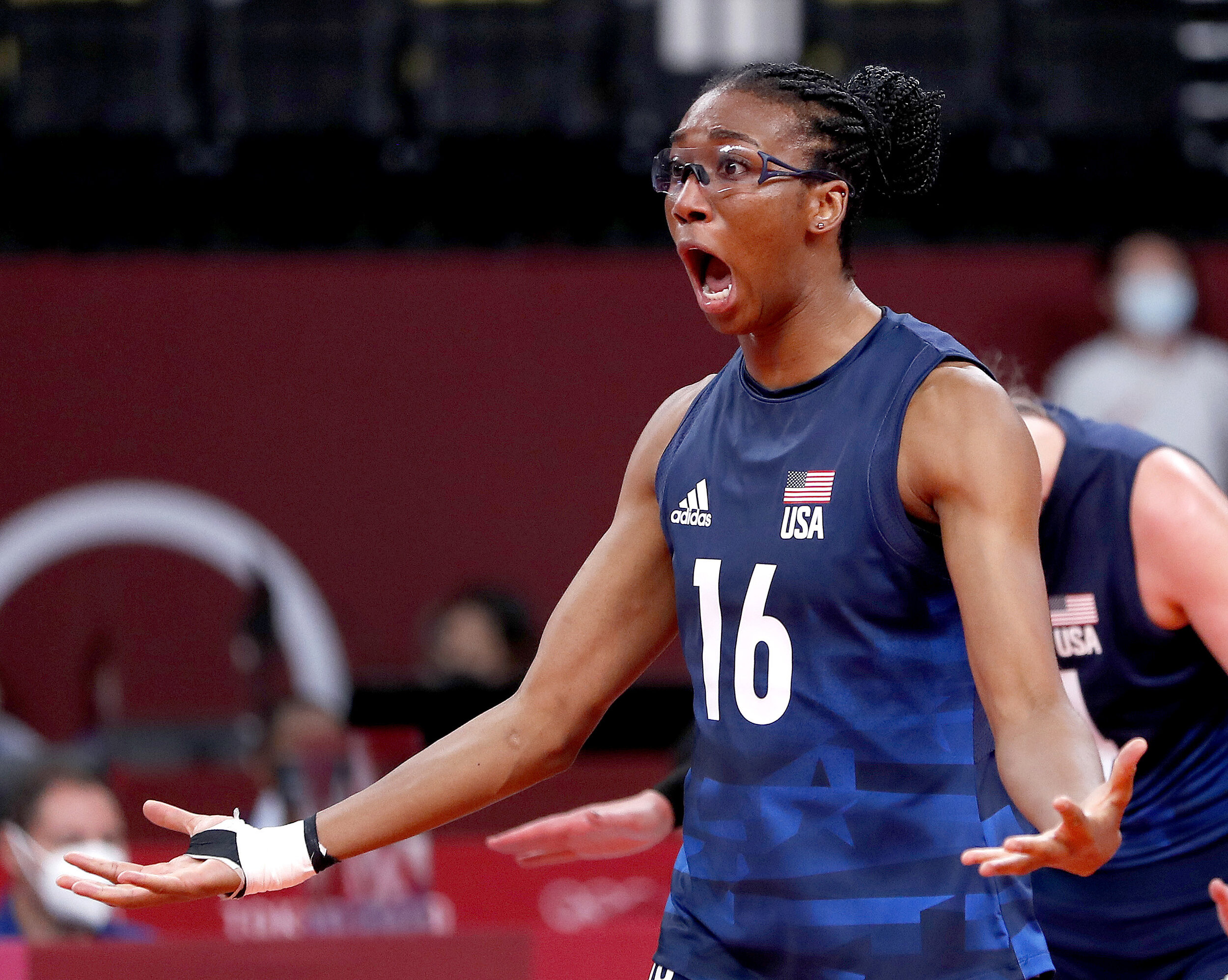  U.S. volleyball player Foluke Akinradewo reacts after a winning shot against Serbia during the Tokyo Olympics. 