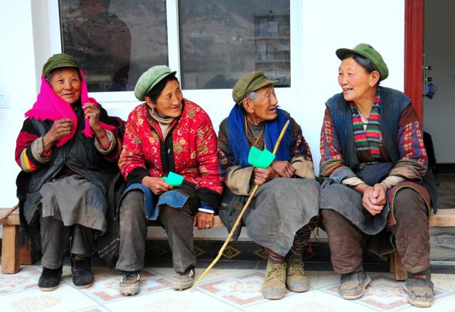 Local villagers waiting to be seen at clinic