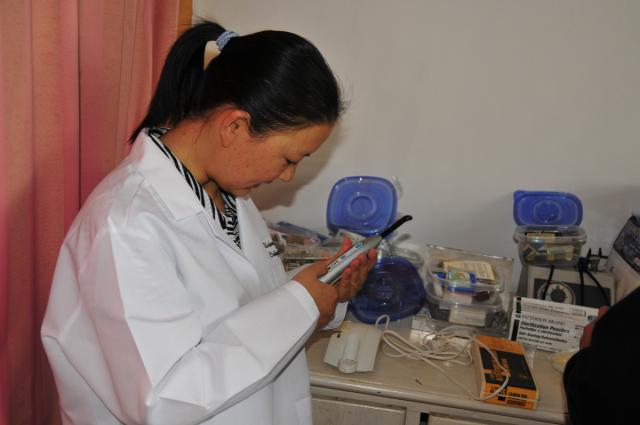 Dentist examining equipment from Dr. James Raecker