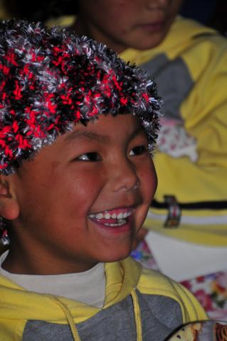 Each child received a new handmade stocking cap